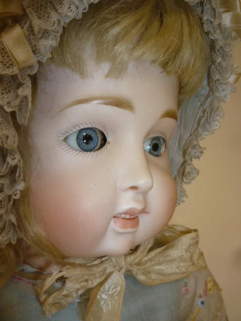 A J.D. Kestner "Bru" bisque head character doll with blue glass sleeping eyes Image