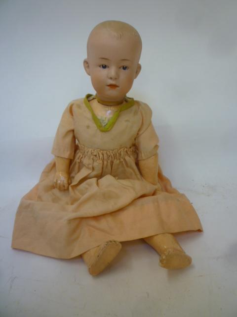 A Gebruder Heubach "Solemn Boy" bisque head doll with painted face Image