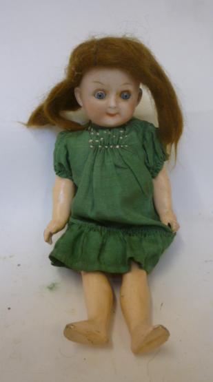 A Gebruder Heubach google eyed bisque head doll Image