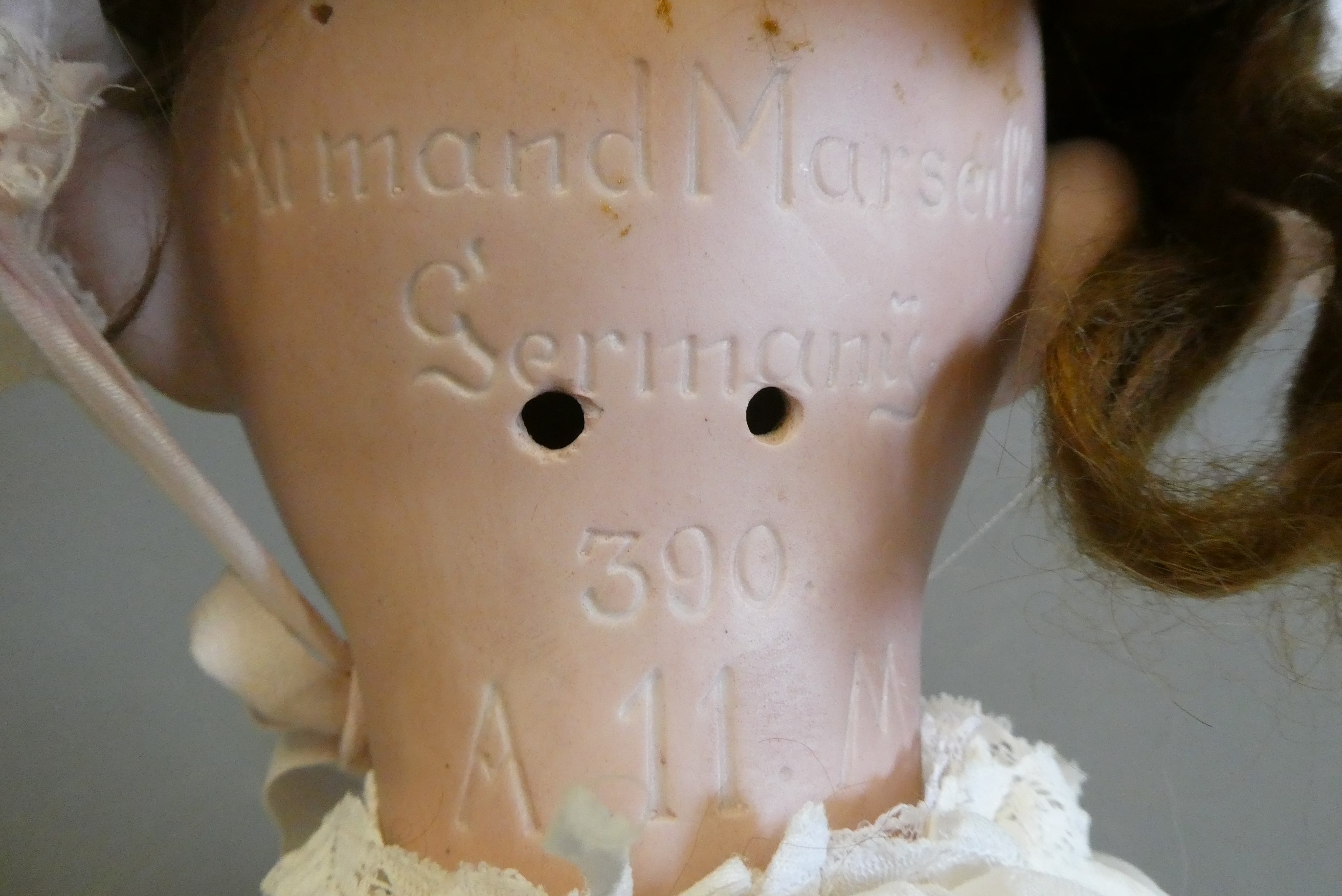 A large Armand Marseille bisque socket head doll, with brown glass sleeping eyes, open mouth, teeth, Image