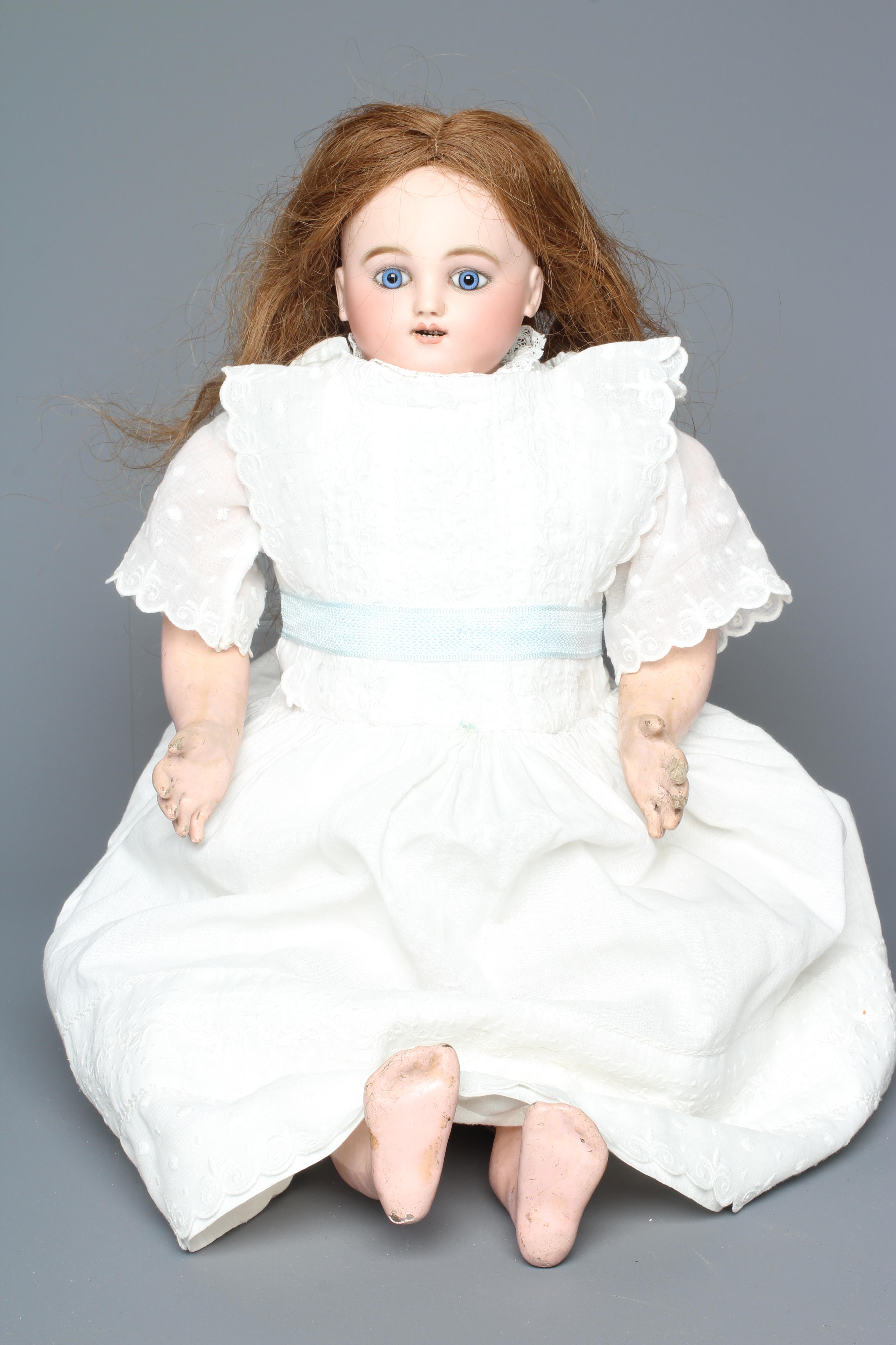 A Jules Steiner bisque head automaton doll Image