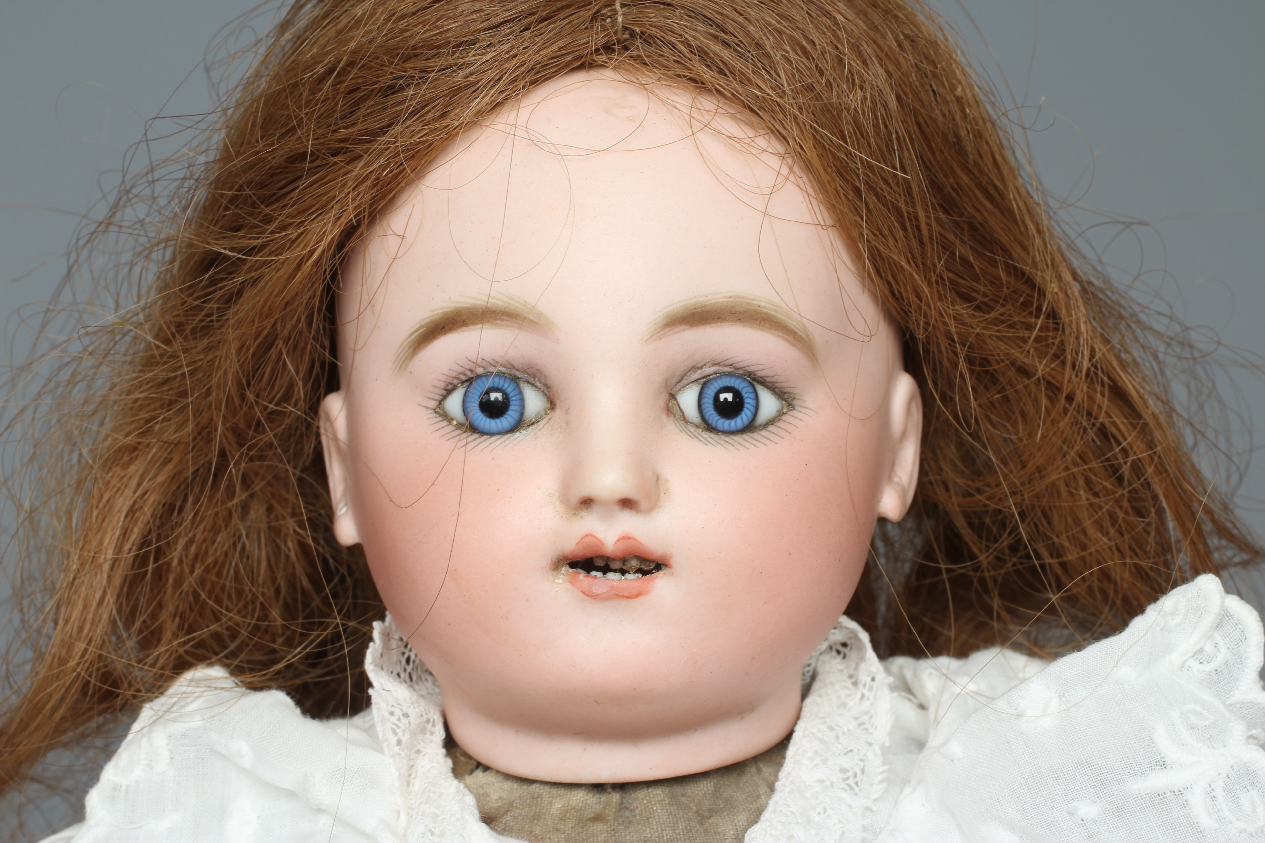 A Jules Steiner bisque head automaton doll Image