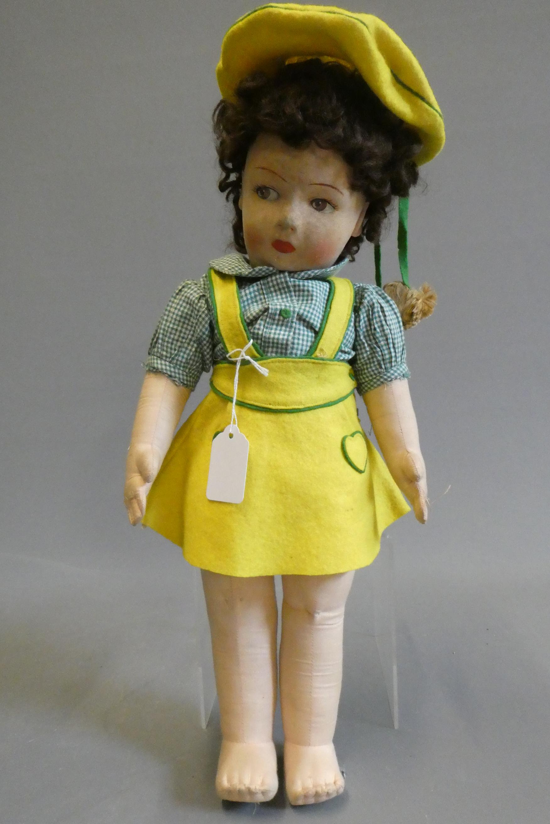 Chad Valley girl doll, of fabric construction, with sideways glancing painted eyes, shirt, felt Image