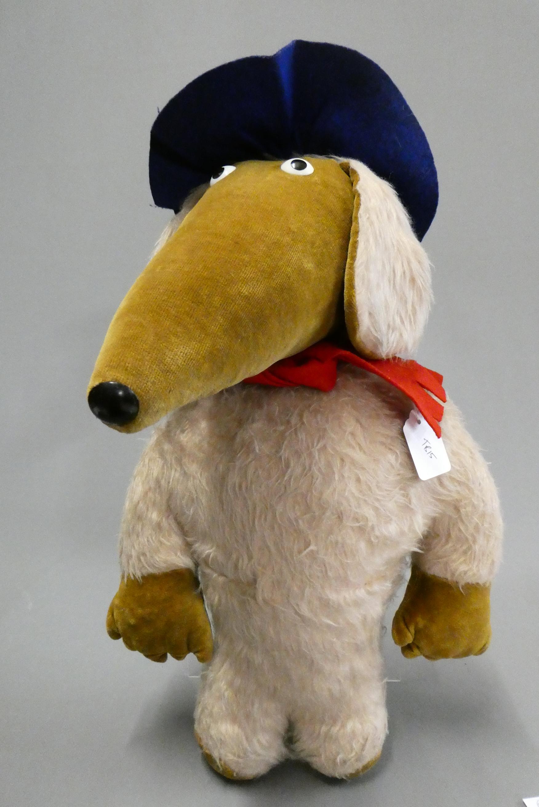 A vintage Womble, with plastic nose and eyes, light plush body, brown velvet face, ears and pads, Image