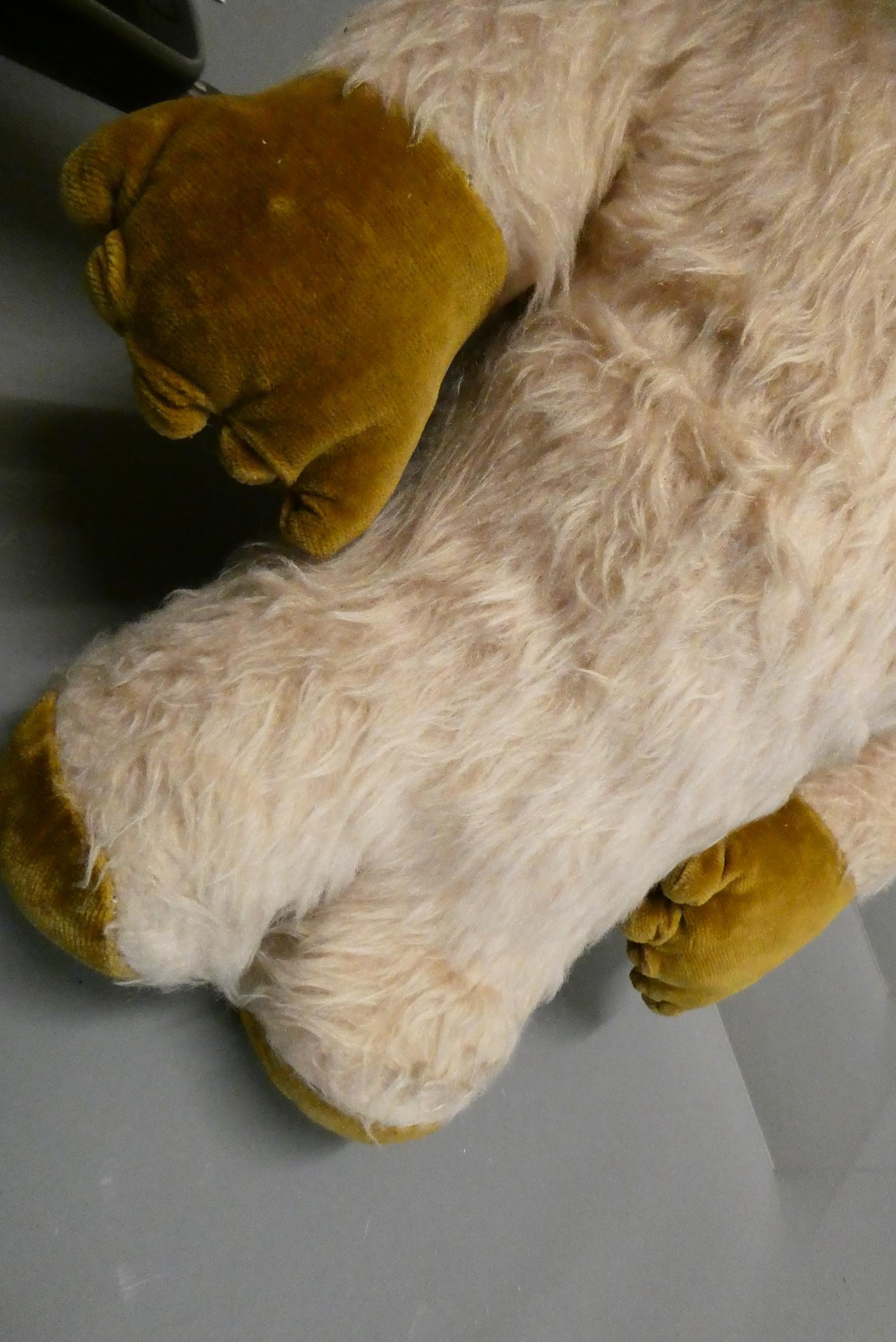 A vintage Womble, with plastic nose and eyes, light plush body, brown velvet face, ears and pads, Image