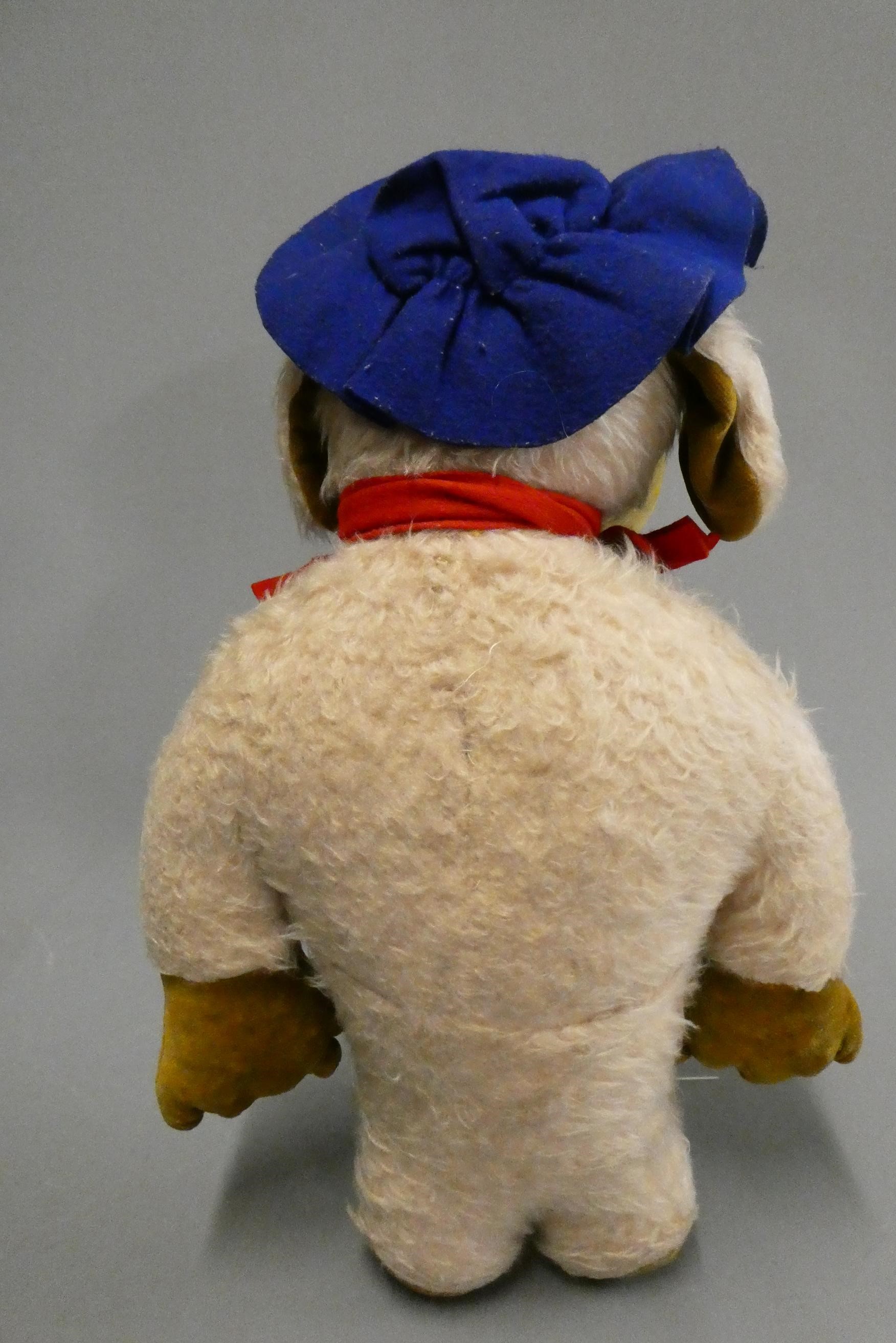 A vintage Womble, with plastic nose and eyes, light plush body, brown velvet face, ears and pads, Image