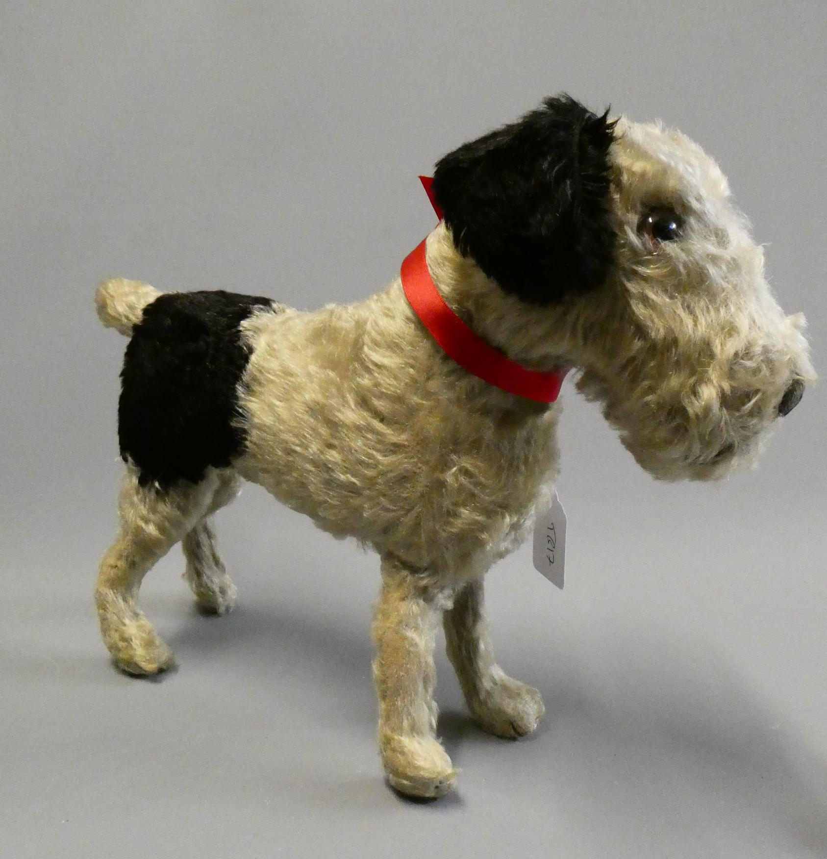 A rare Steiff Airedale(?) terrier, with amber glass eyes, sewn nose, white plush with black spots, Image