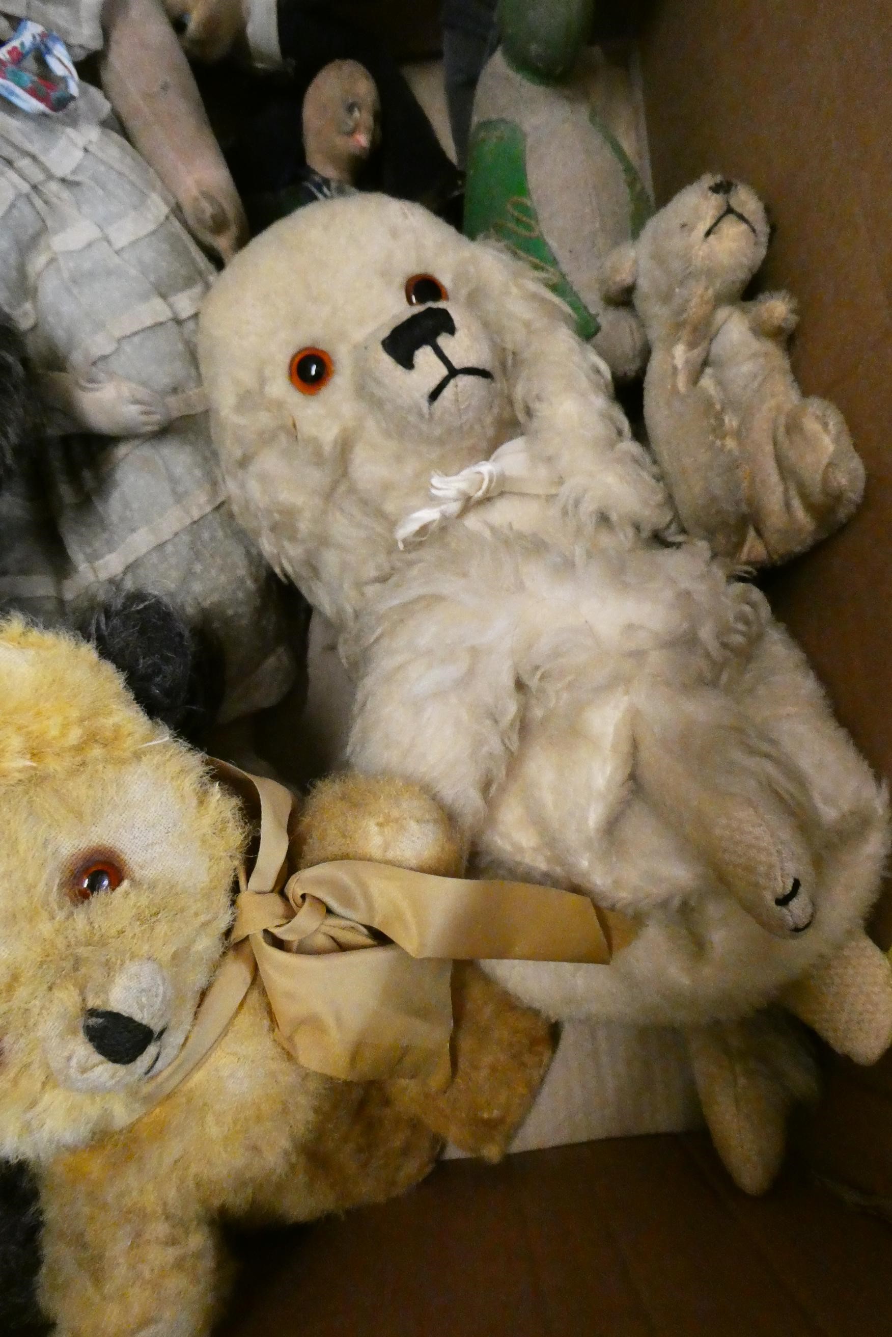 A collection of plush and soft toys Image