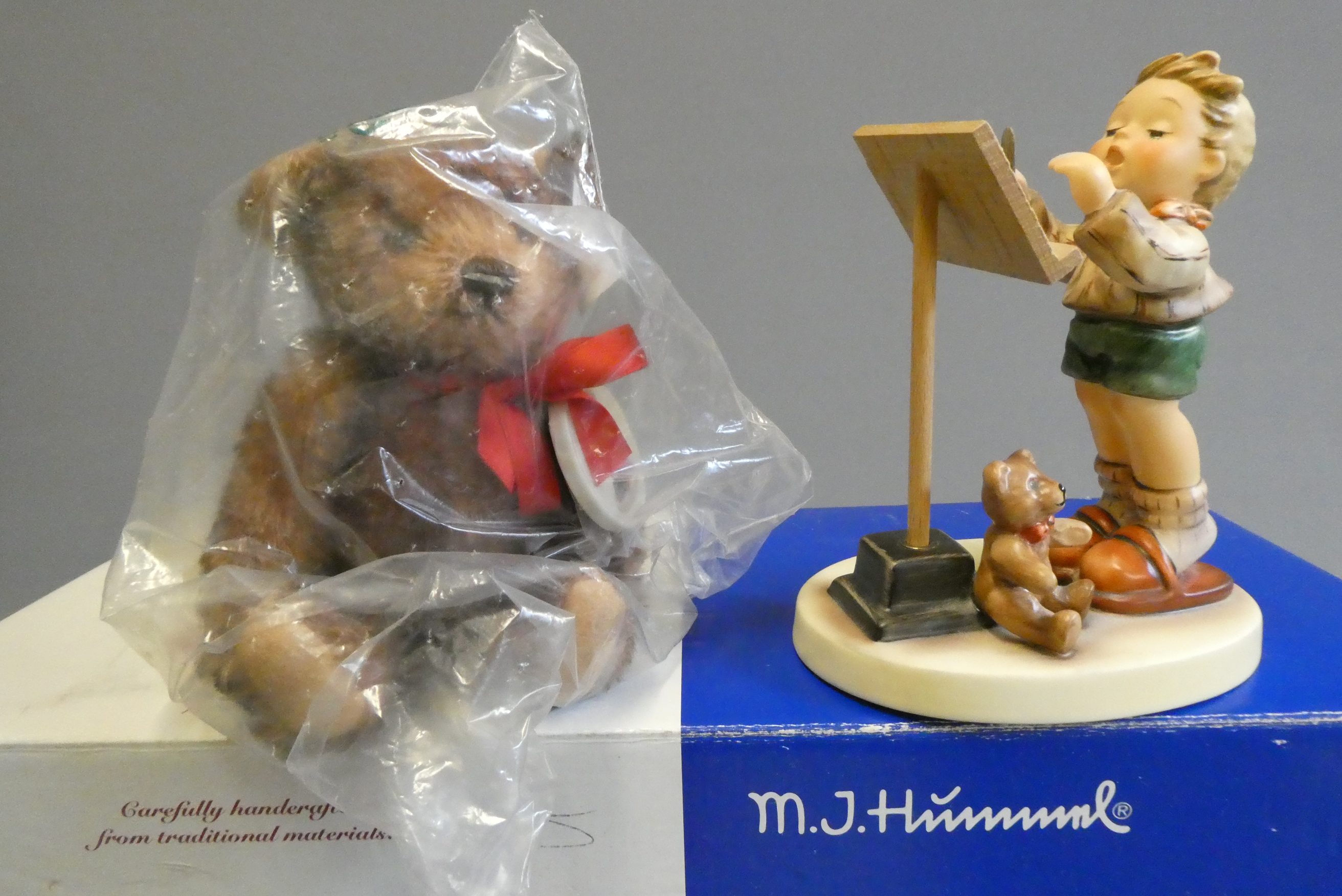 A boxed Steiff "Little Maestro" limited edition boxed set, with small brown bear with ceramic Image