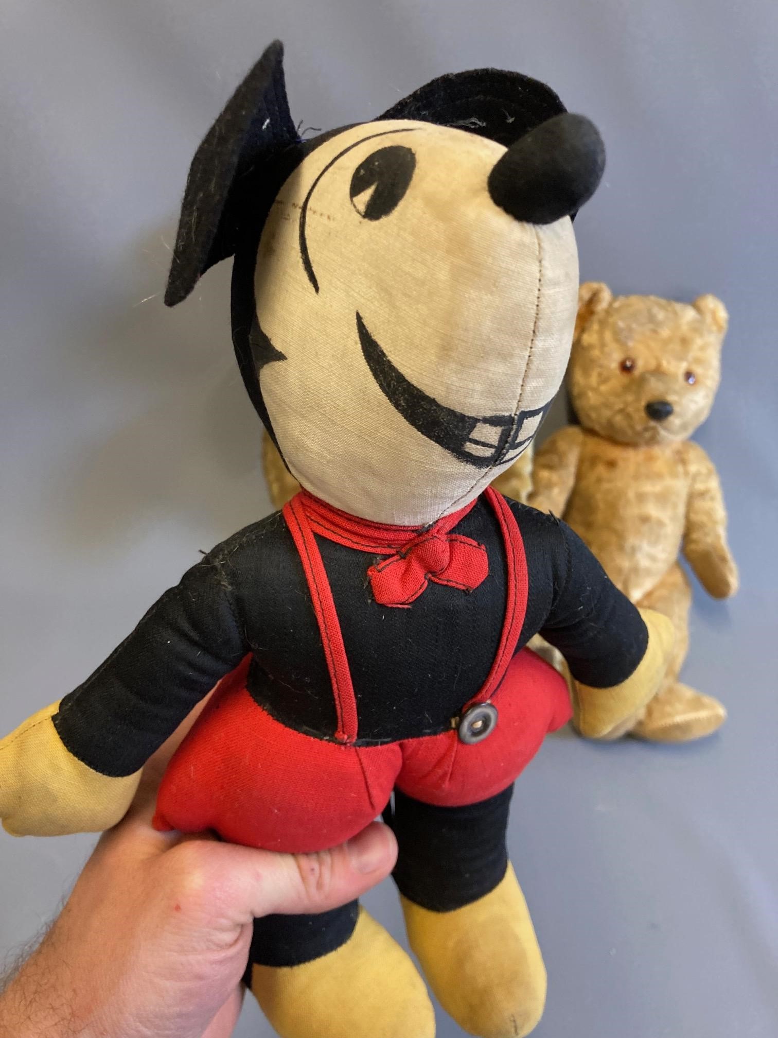 Three vintage soft toys, comprising two teddy bears with plastic noses and jointed bodies, together Image