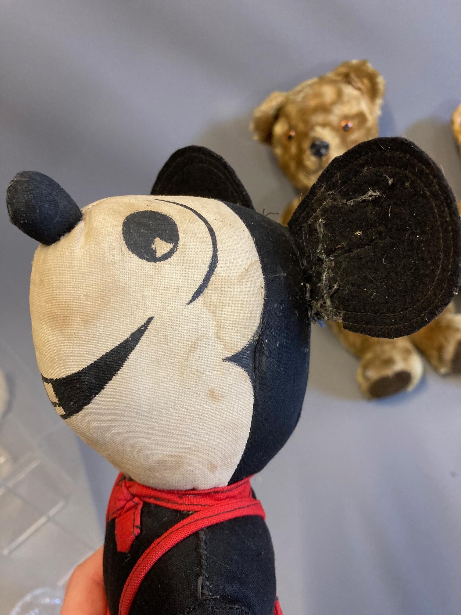 Three vintage soft toys, comprising two teddy bears with plastic noses and jointed bodies, together Image