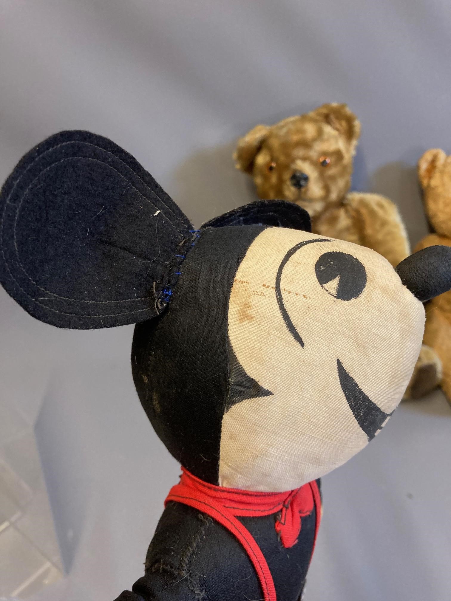 Three vintage soft toys, comprising two teddy bears with plastic noses and jointed bodies, together Image