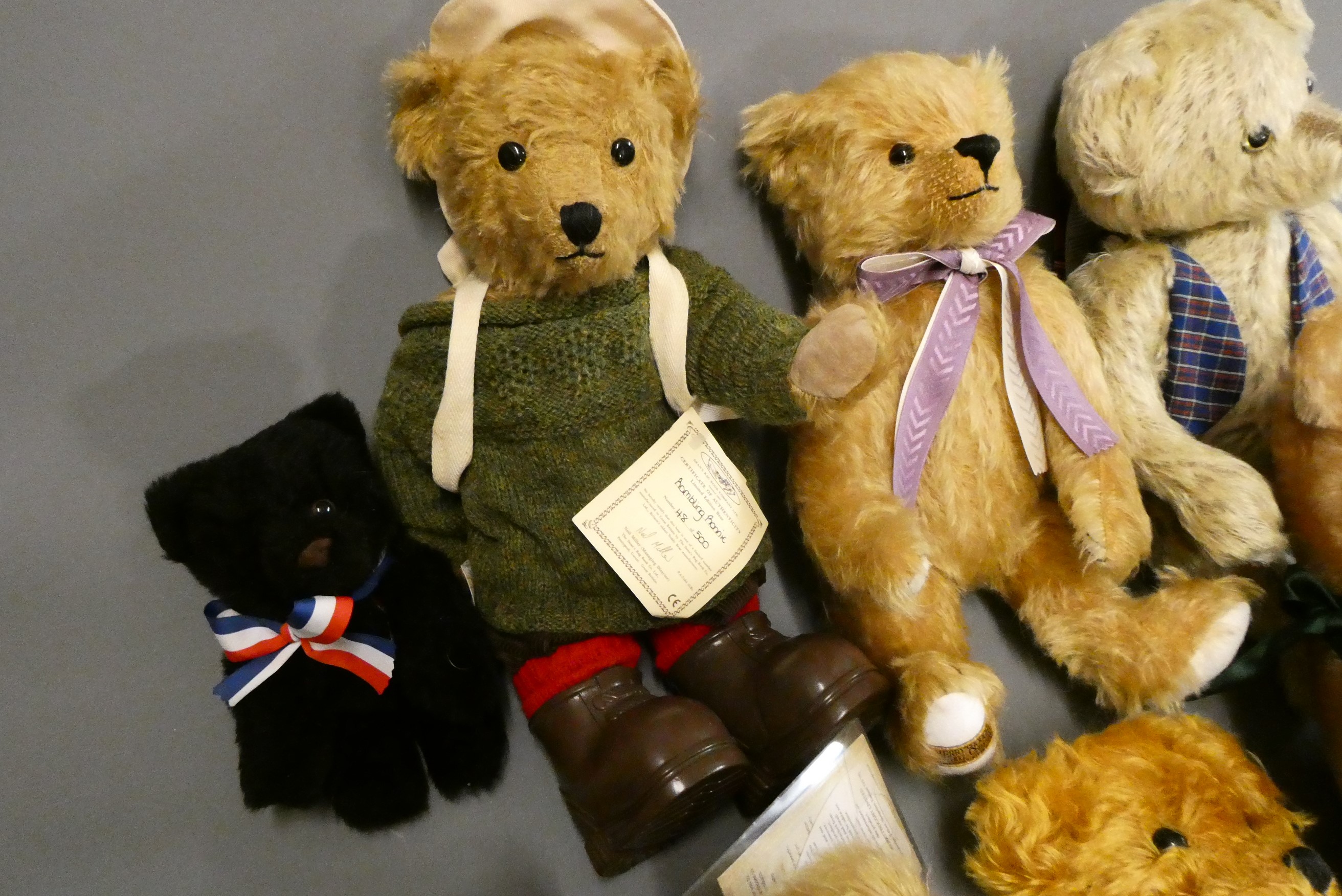 Eight collectors teddy bears, comprising five Merrythought bears including limited editions and one Image