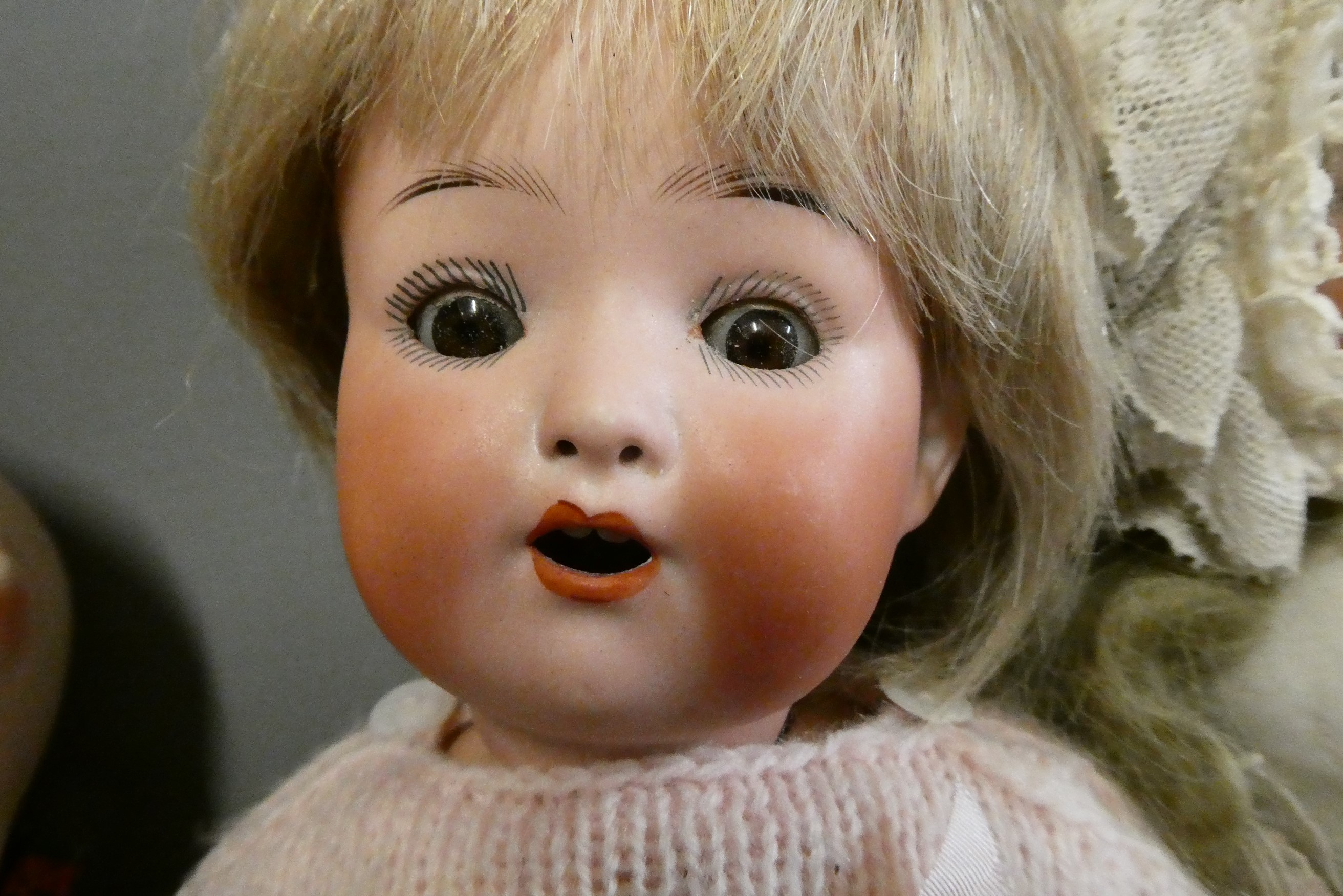 Four bisque head dolls Image