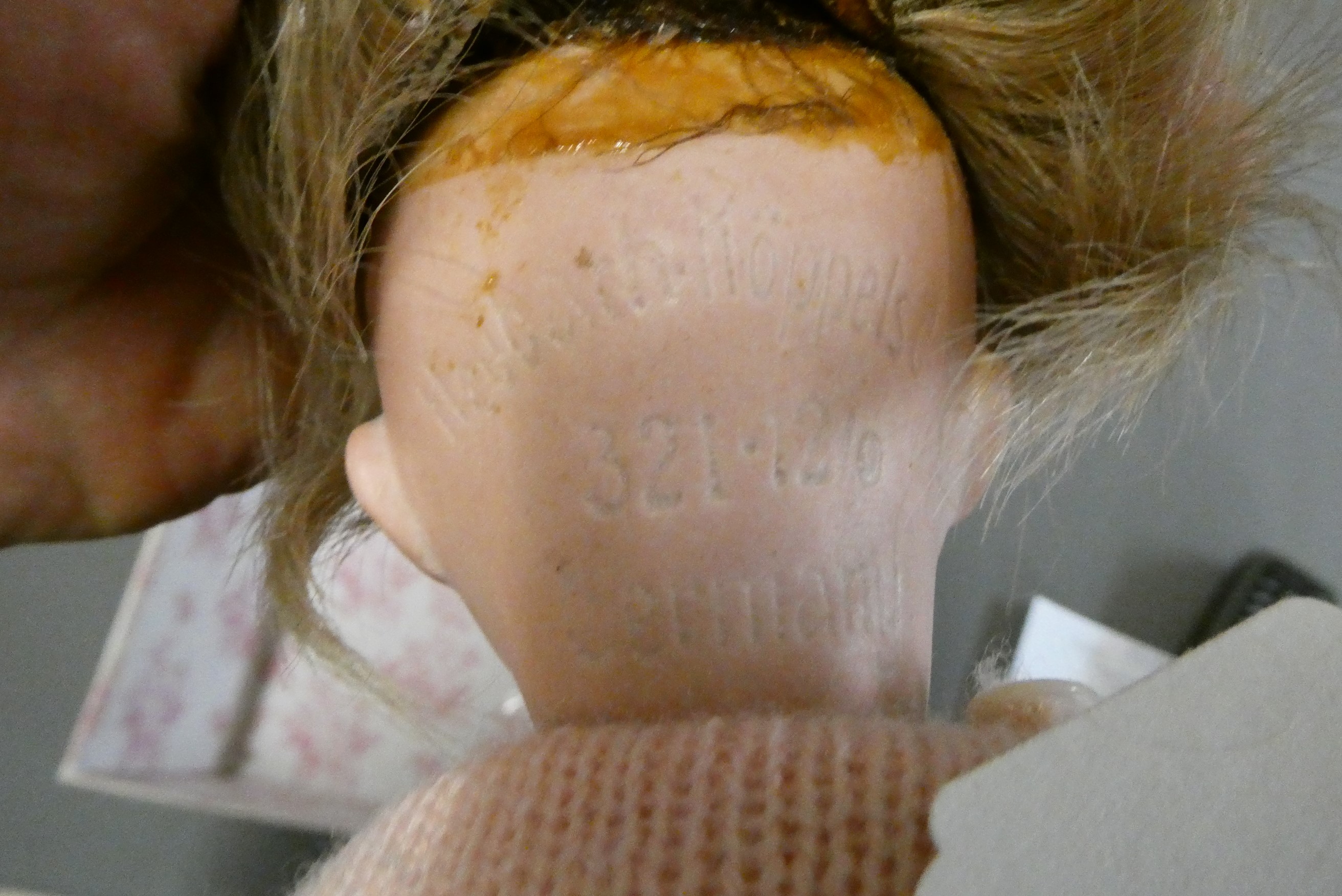 Four bisque head dolls Image