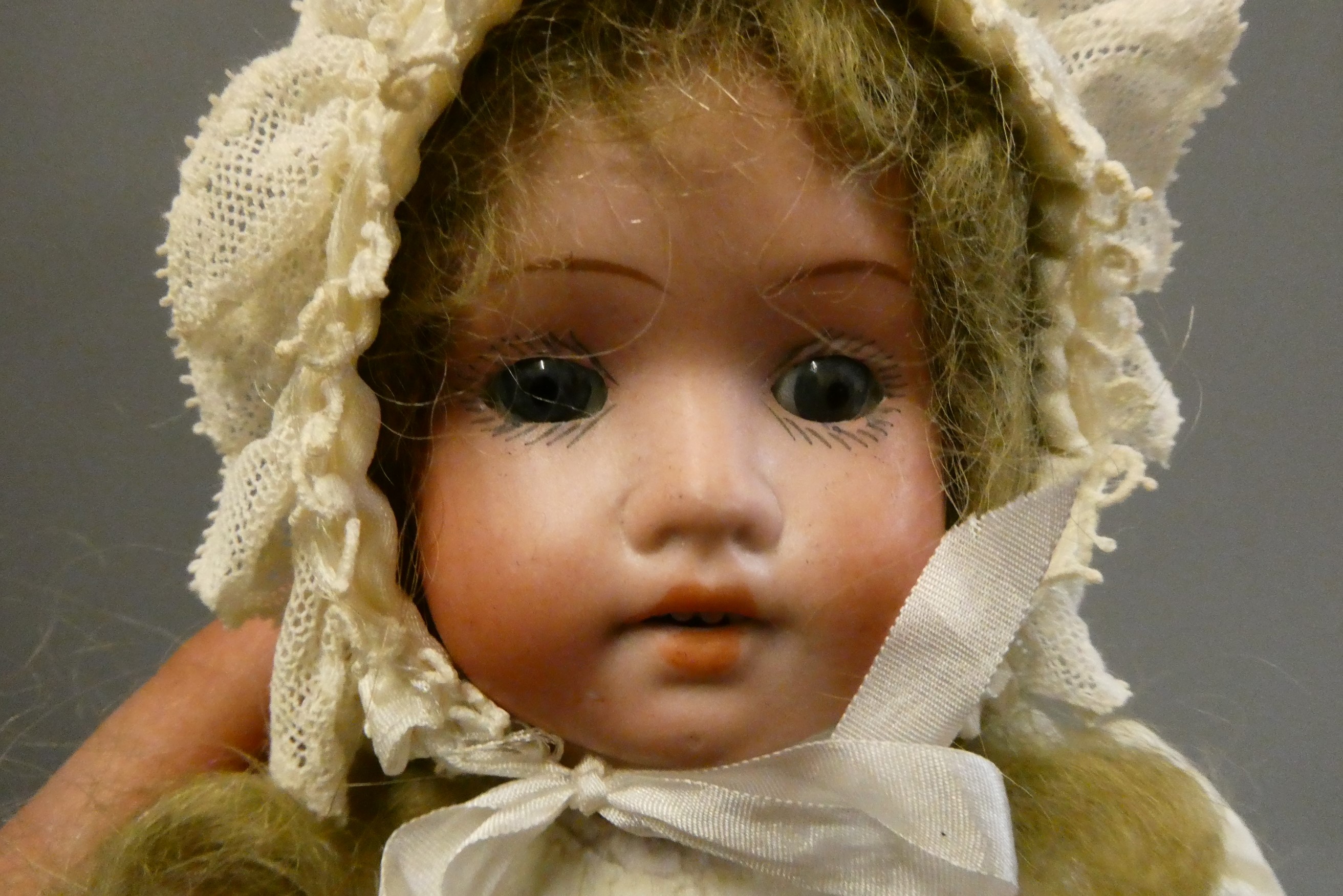 Four bisque head dolls Image