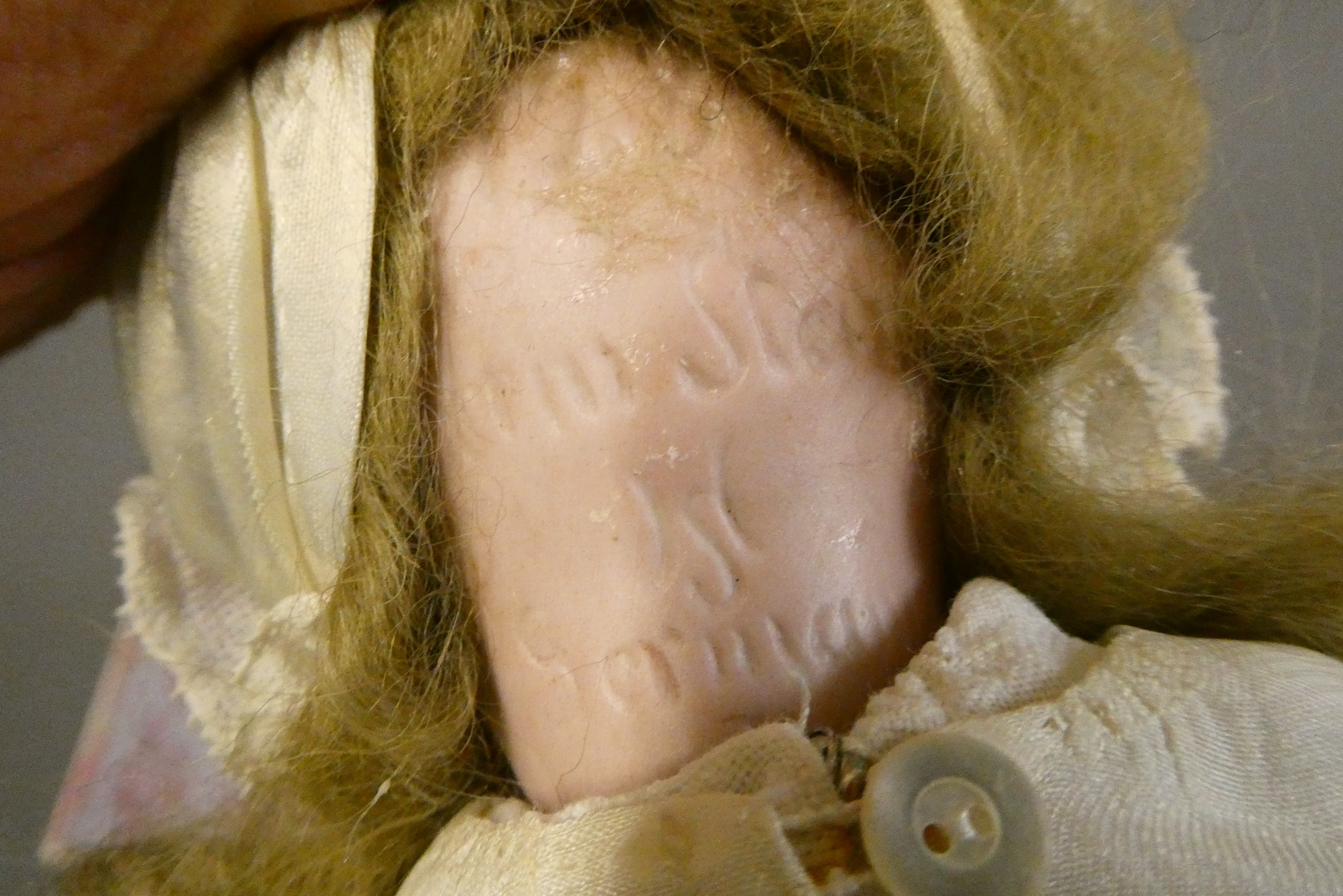 Four bisque head dolls Image