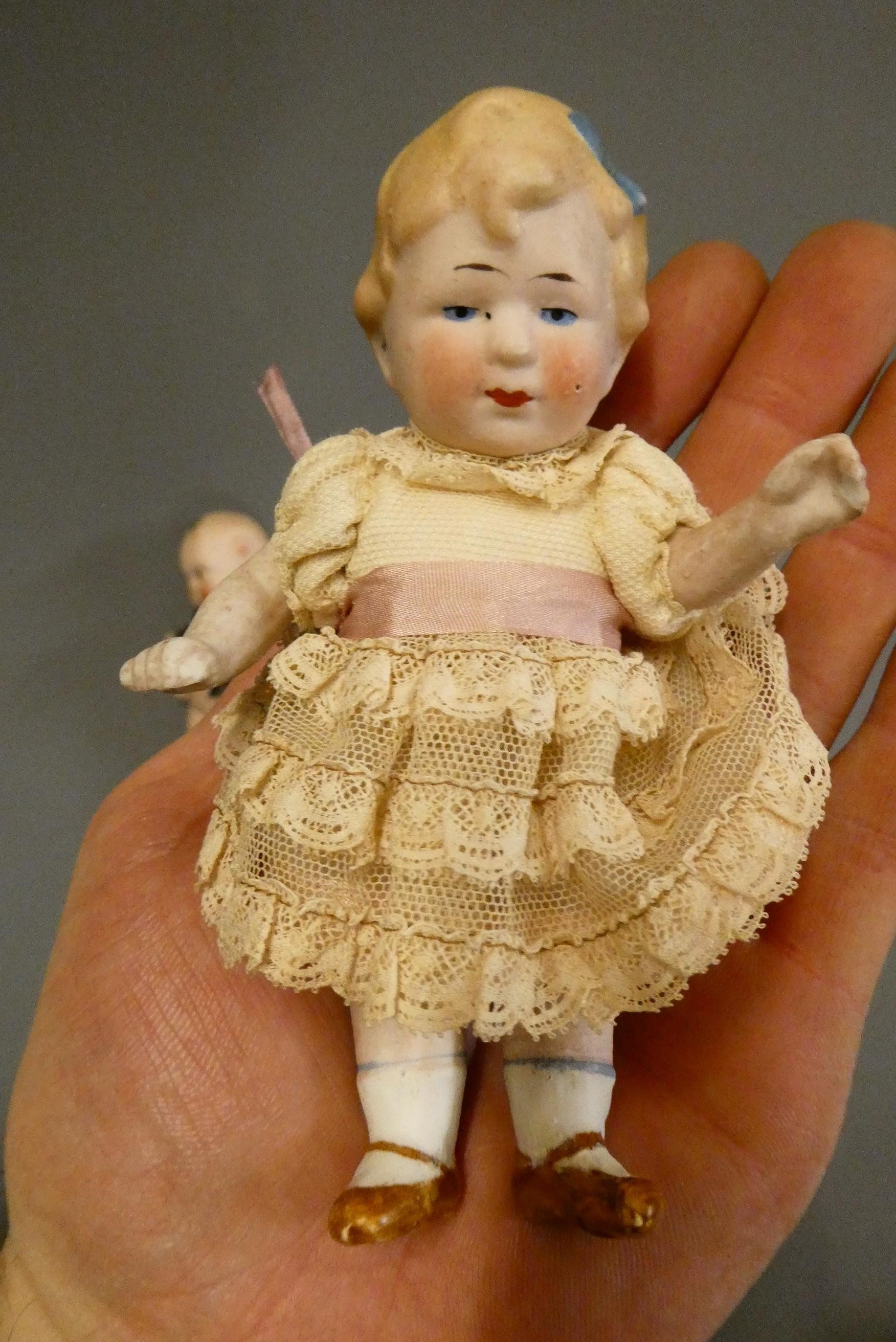 Four bisque head dolls Image
