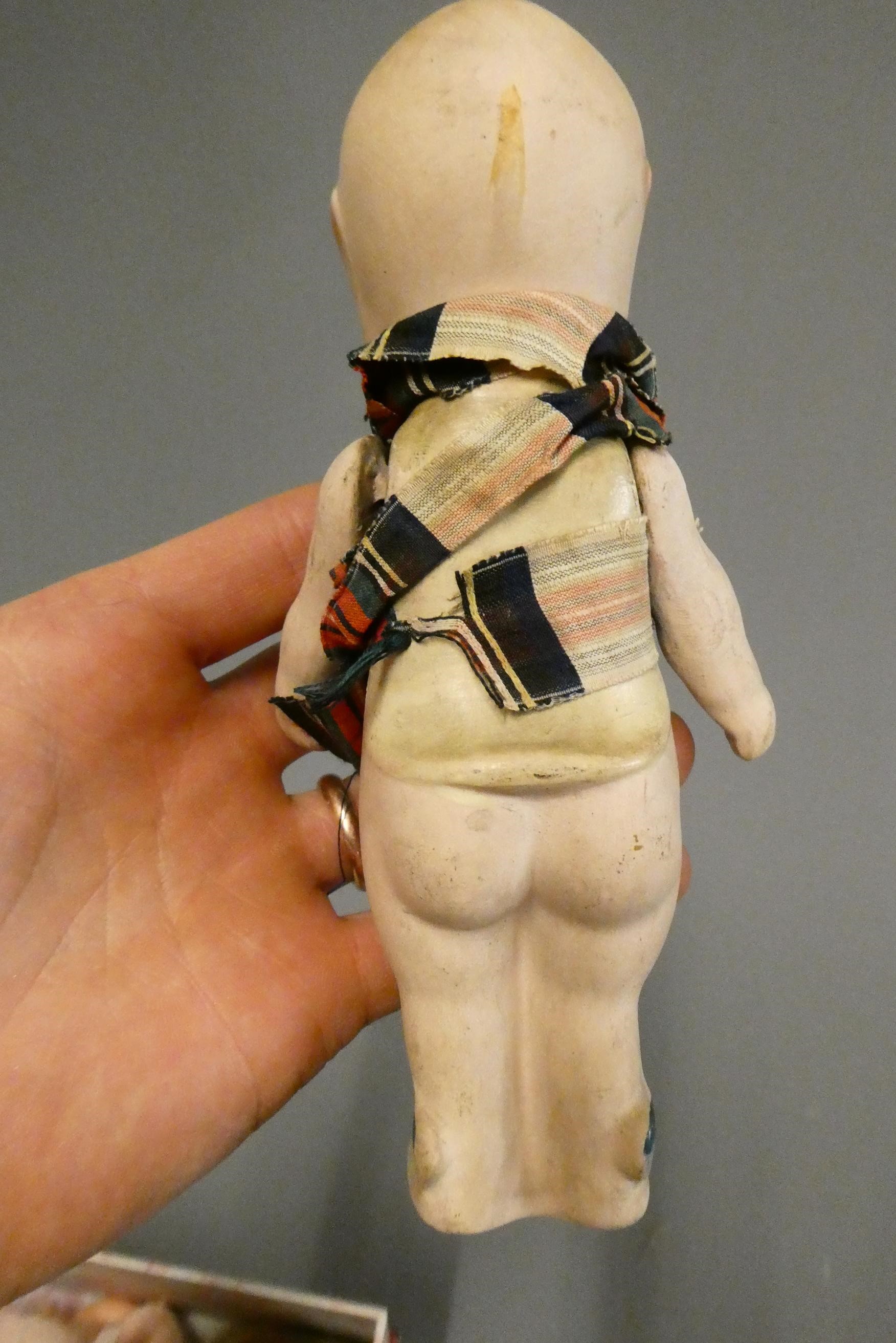 Four bisque head dolls Image
