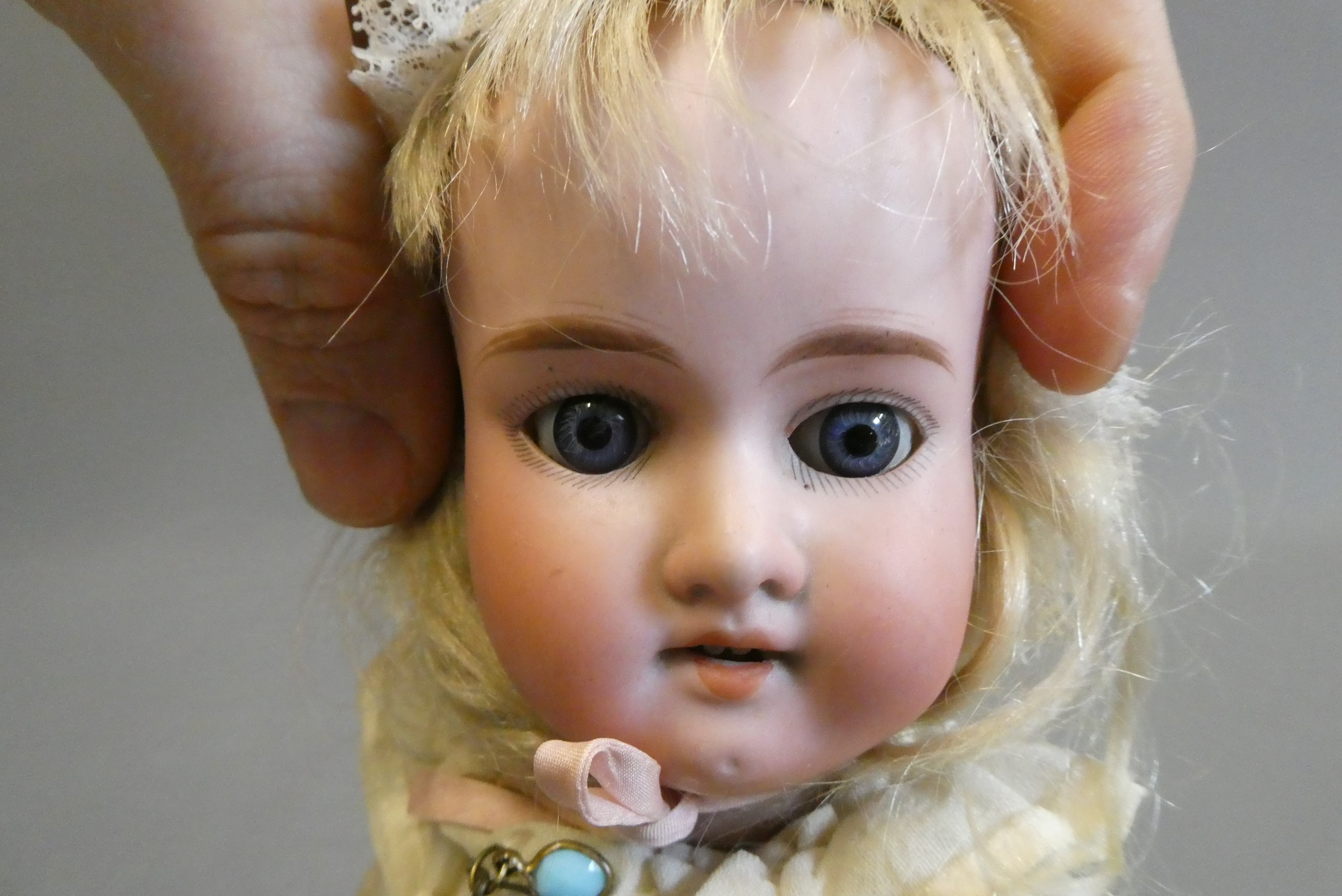 An Armand Marseille bisque socket head doll Image