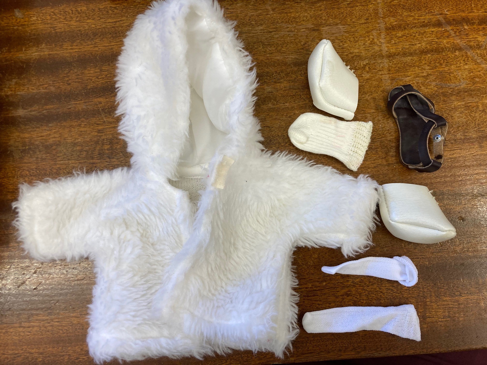Sasha girl doll, with blond hair and jointed body, 16" long, with some spare clothing Image