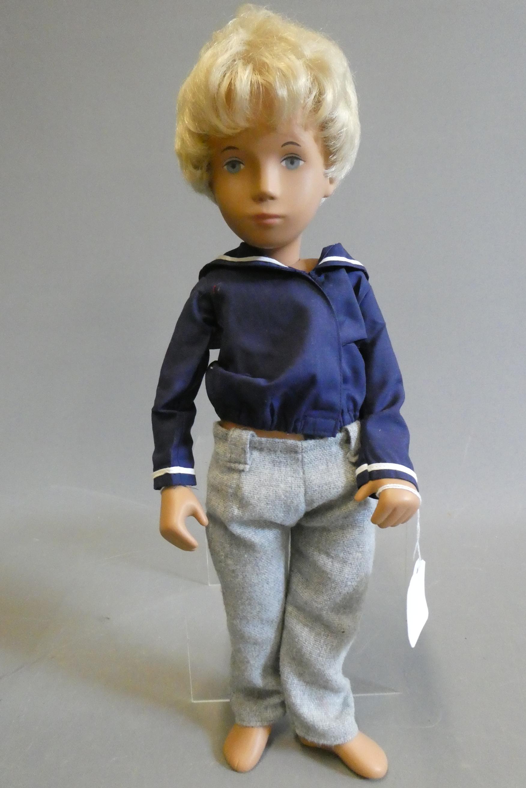 Sasha Serie boy doll, with blond hair, jointed body and wrist tag, 16" long Image