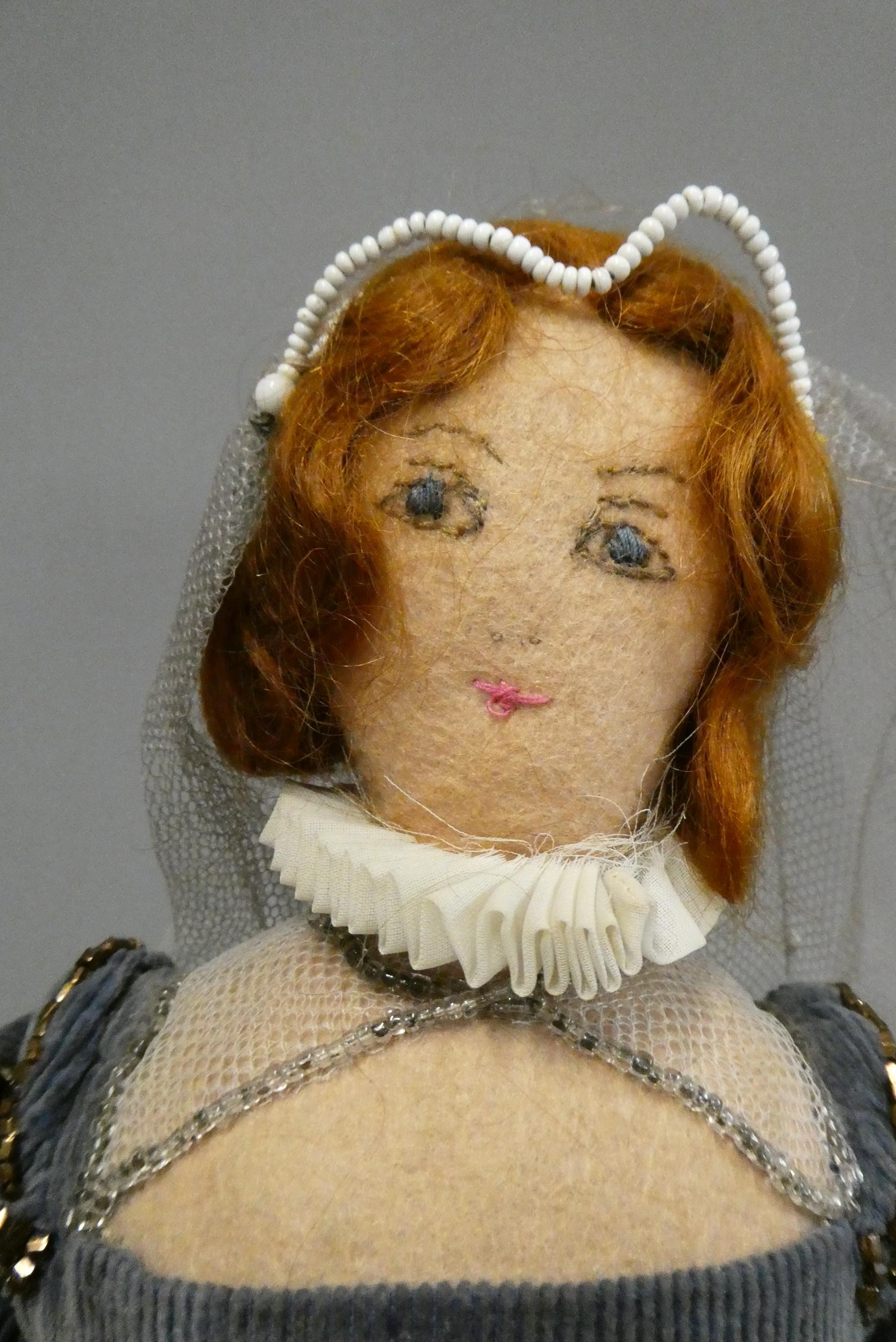 A vintage felt doll Image