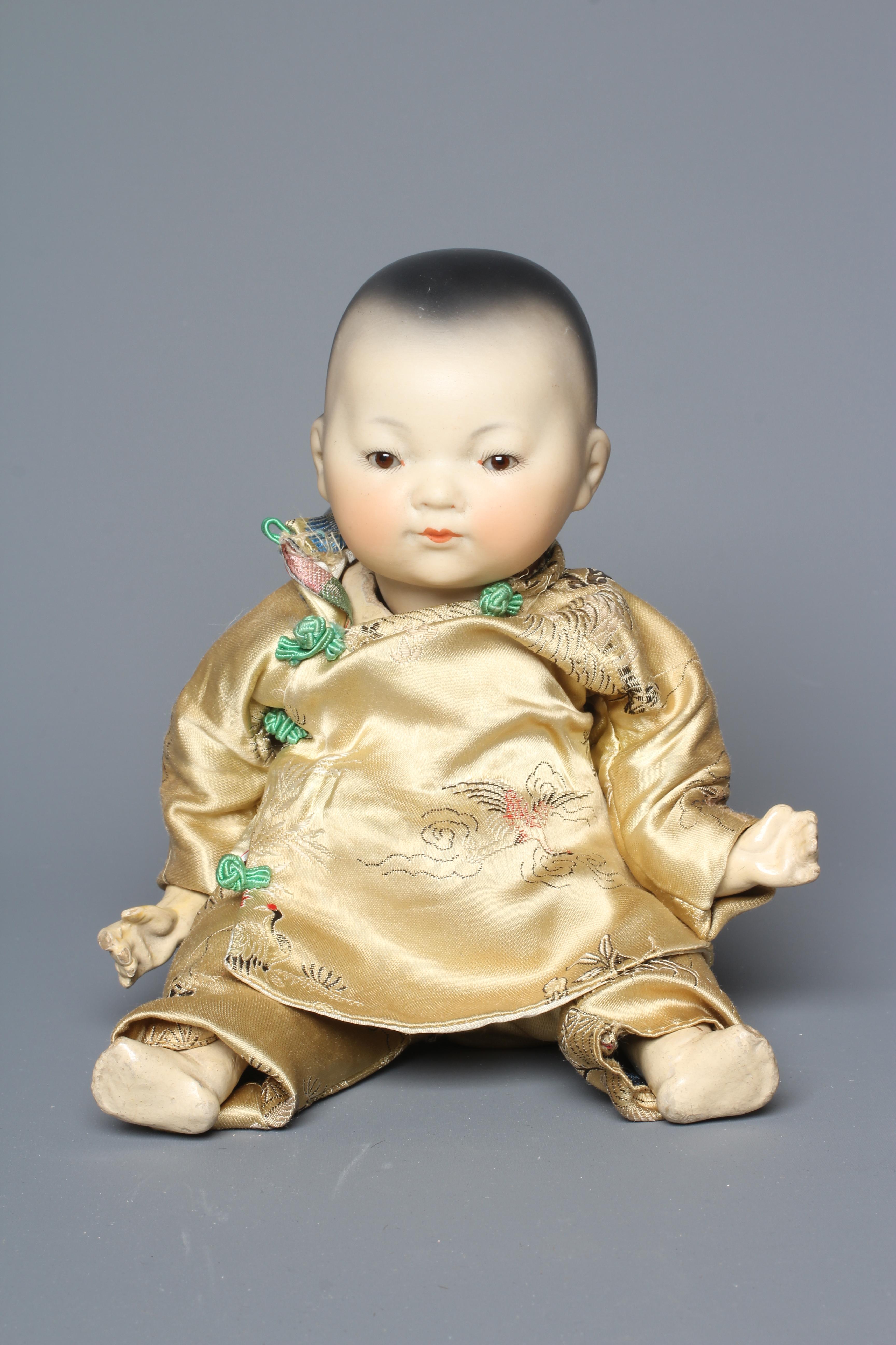 An Armand Marseille bisque socket head "Ellar" doll, with brown glass sleeping eyes, closed mouth, Image