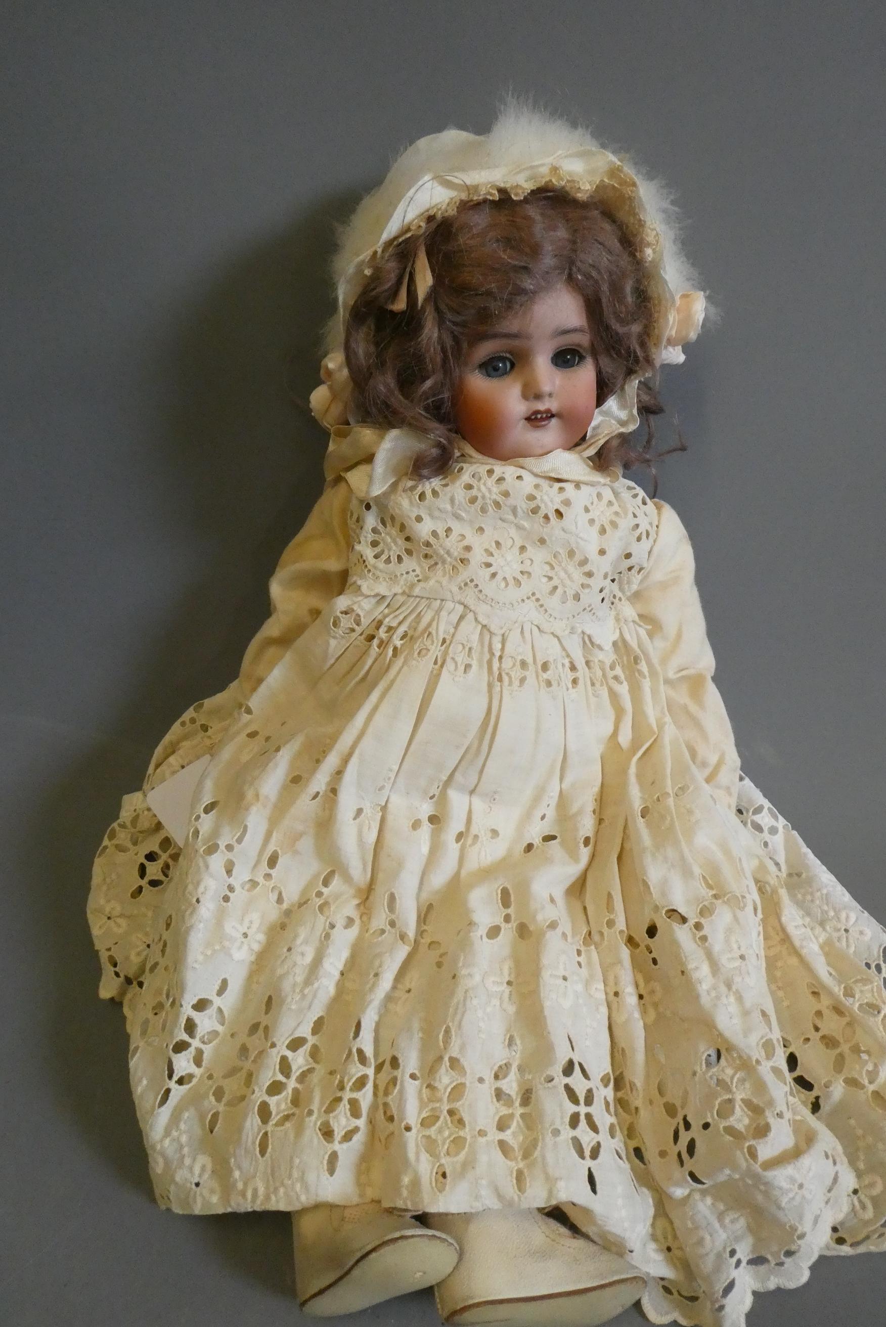 A Simon & Halbig bisque socket head doll Image