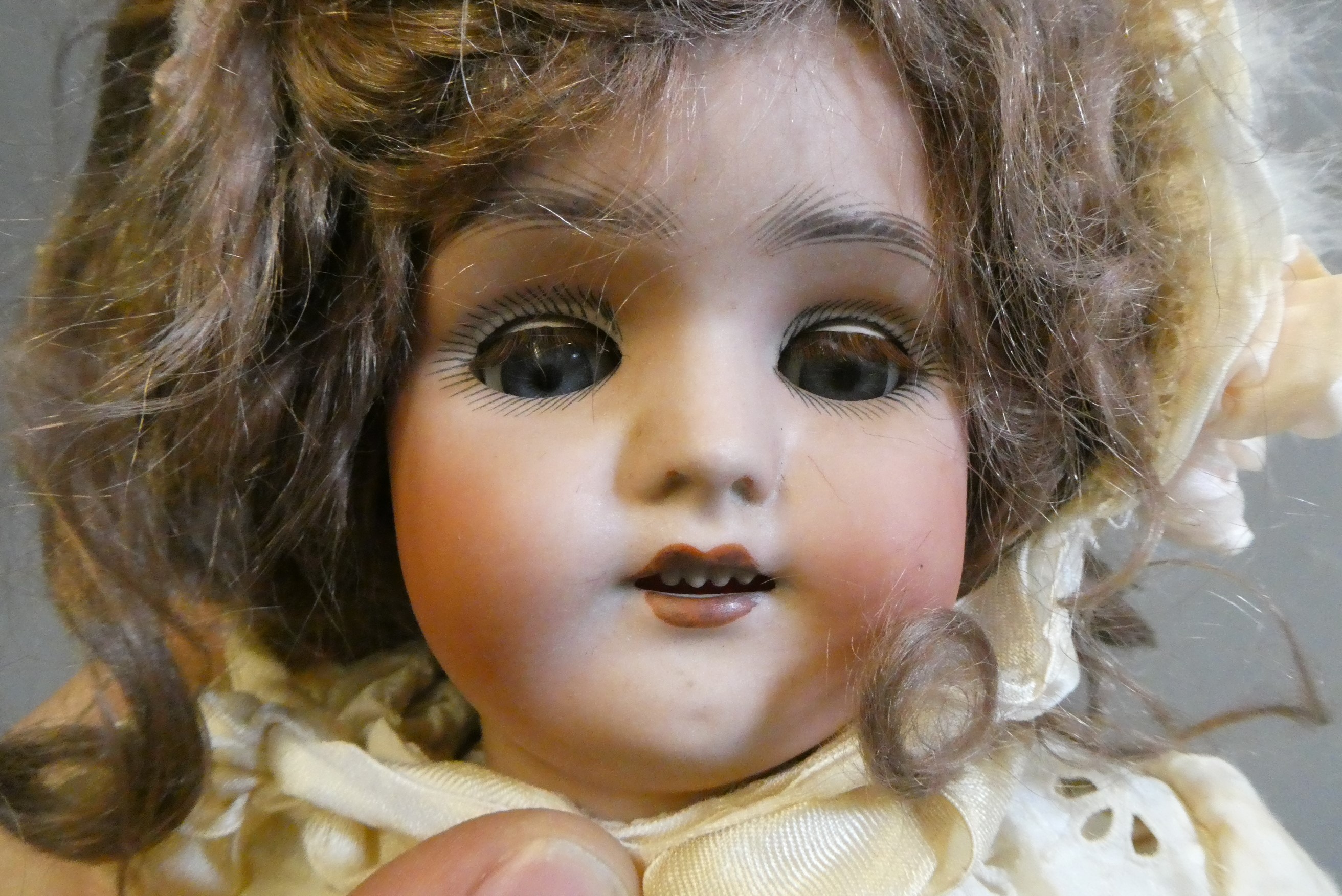 A Simon & Halbig bisque socket head doll Image