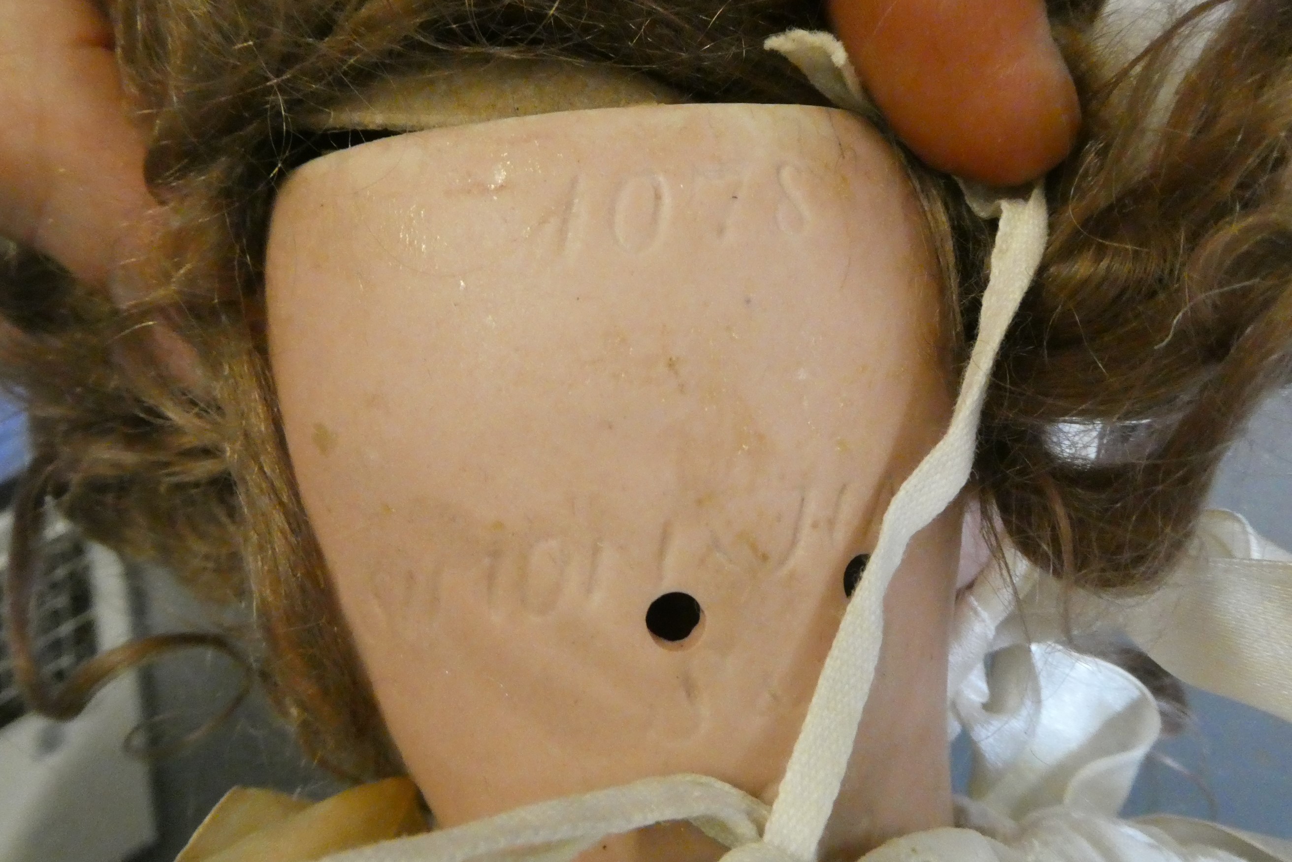 A Simon & Halbig bisque socket head doll Image