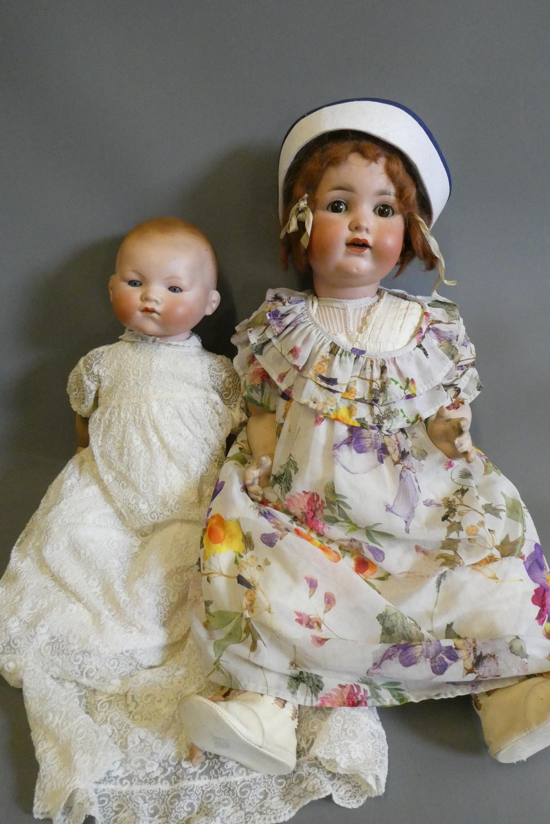 Two Armand Marseille bisque head dolls Image
