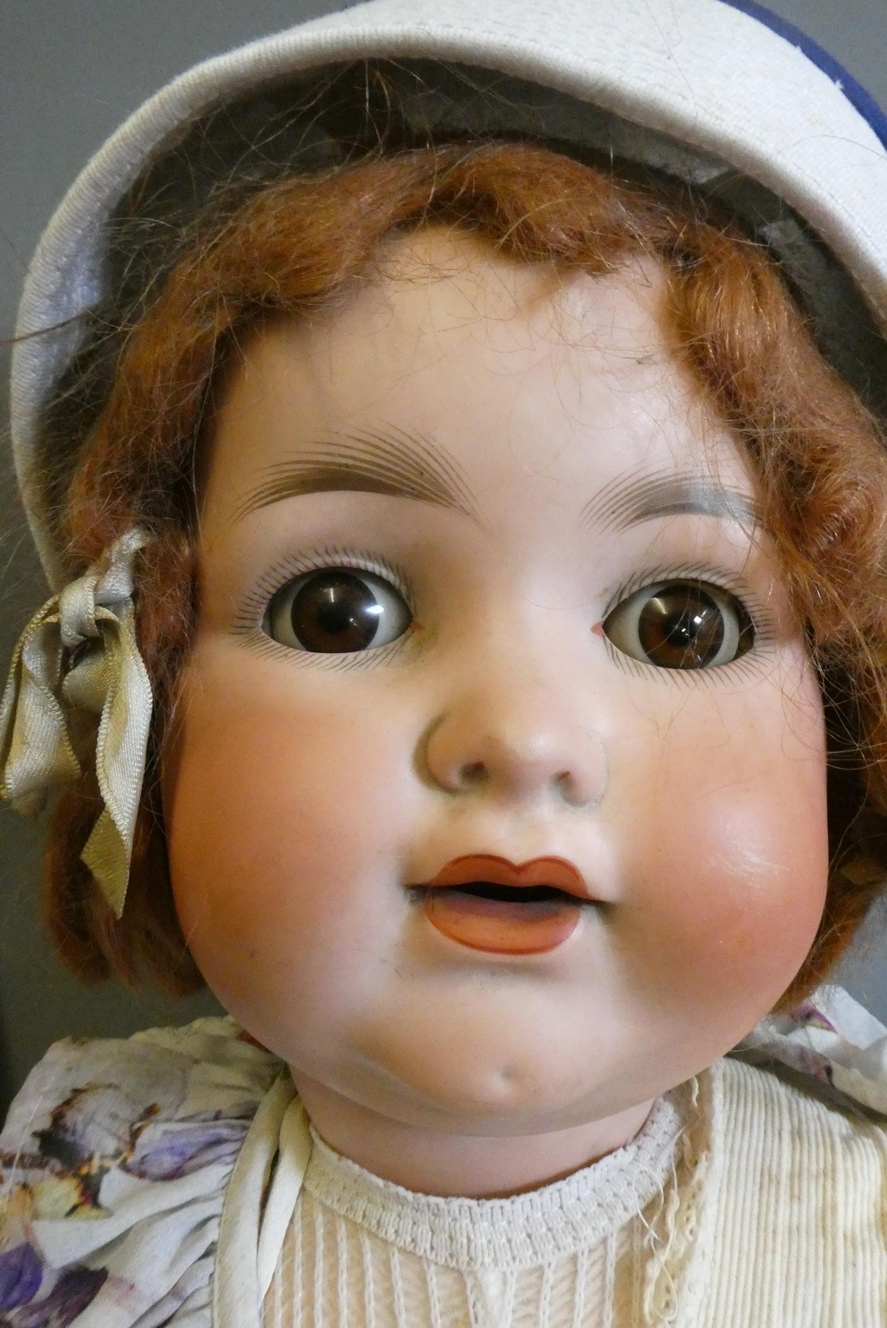 Two Armand Marseille bisque head dolls Image