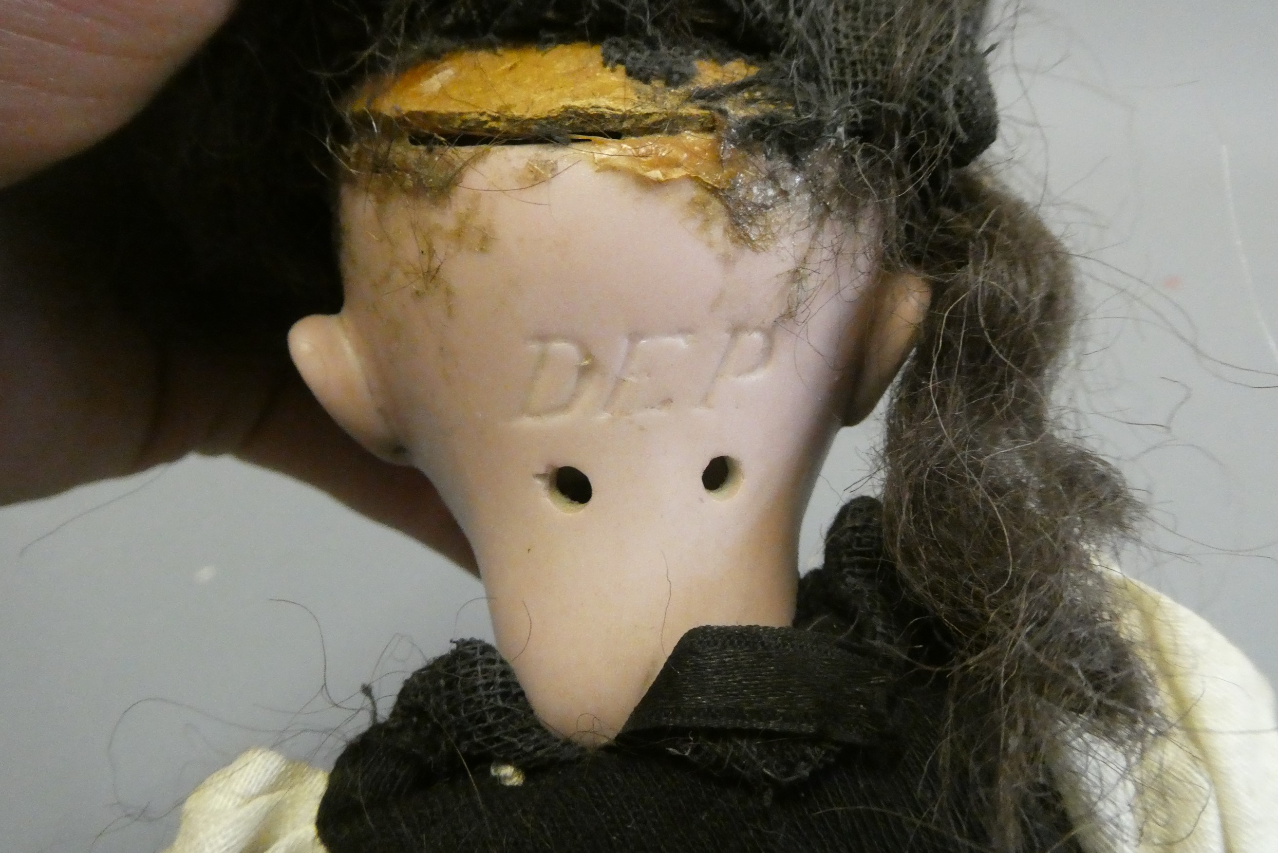 A bisque socket head doll Image