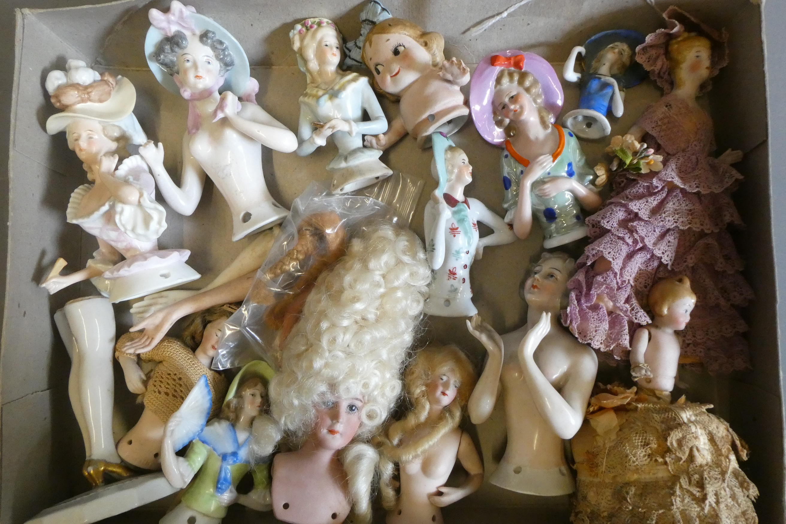Fourteen pin cushion dolls, including one shoulder head example, and thirteen with full torsos Image
