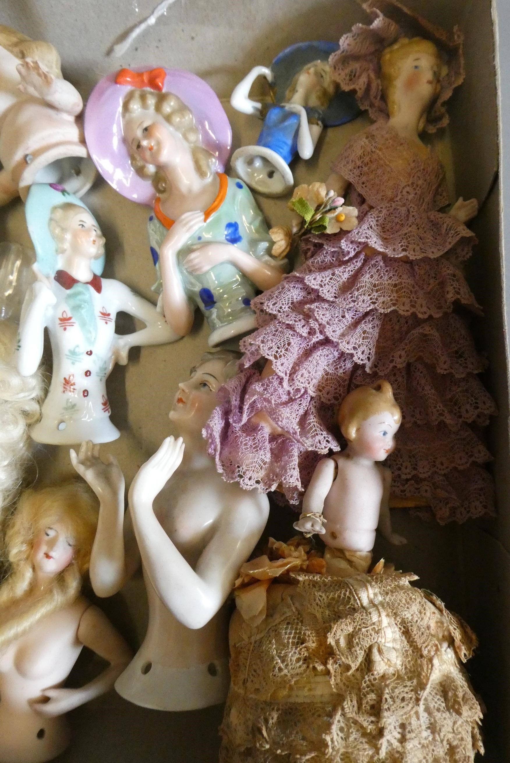 Fourteen pin cushion dolls, including one shoulder head example, and thirteen with full torsos Image