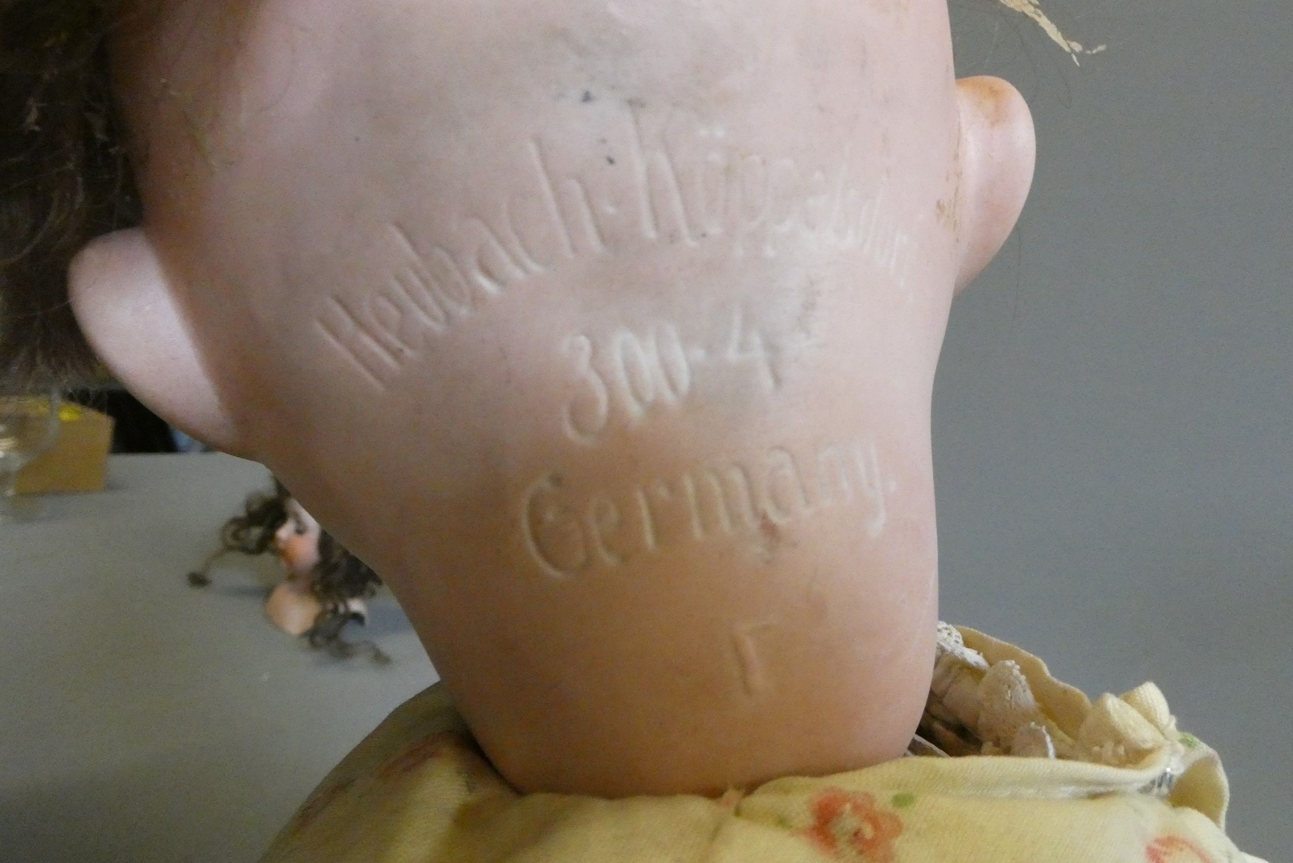 Three bisque head dolls Image