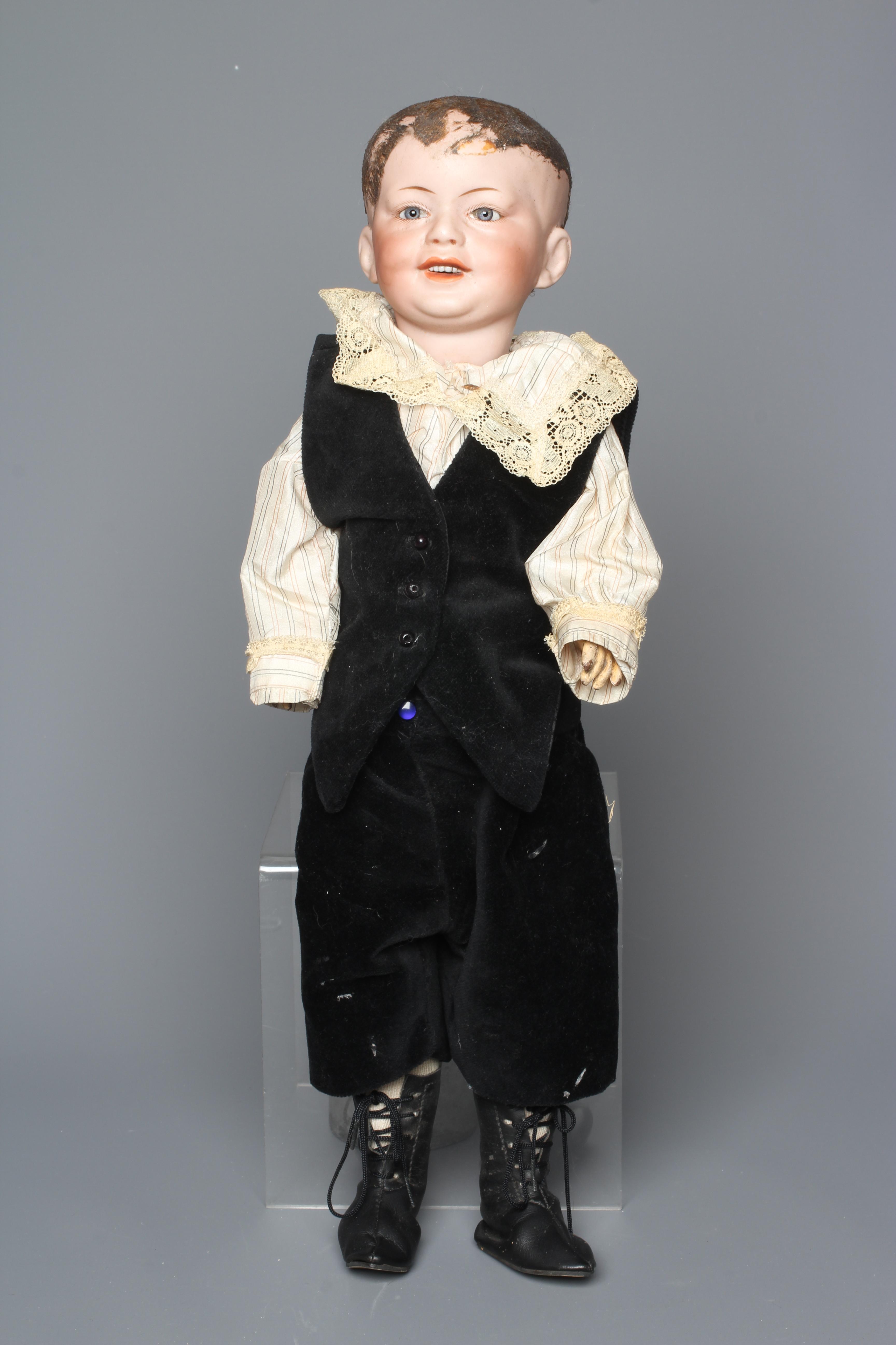 An SFBJ bisque socket head character boy doll, with blue glass fixed eyes, open mouth, teeth, Image