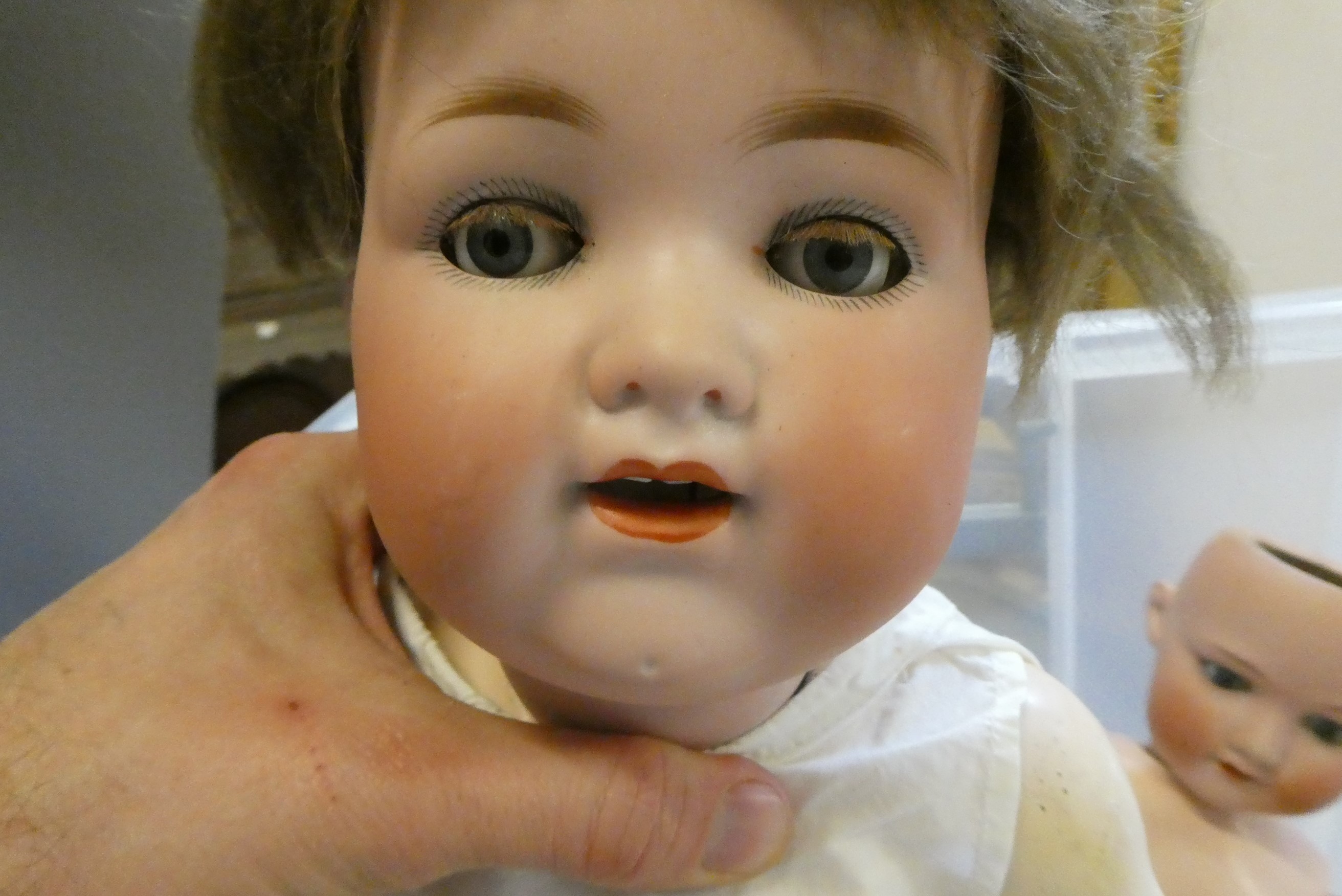 Four Armand Marseille bisque head dolls Image