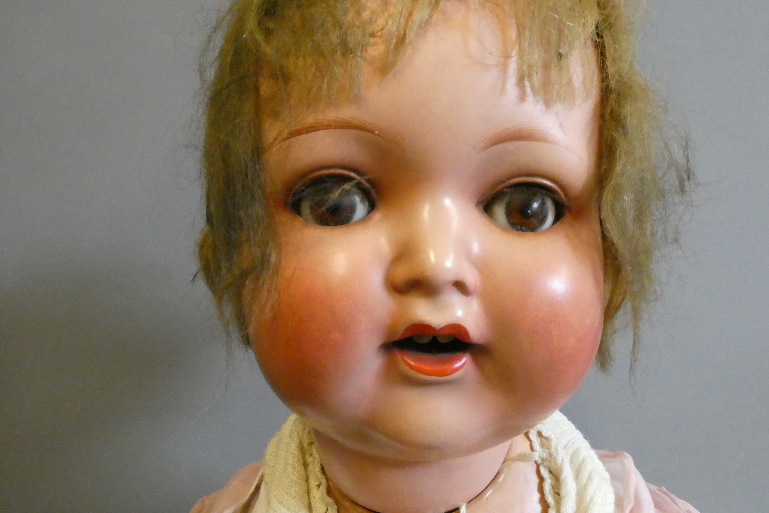 Three bisque socket head dolls Image
