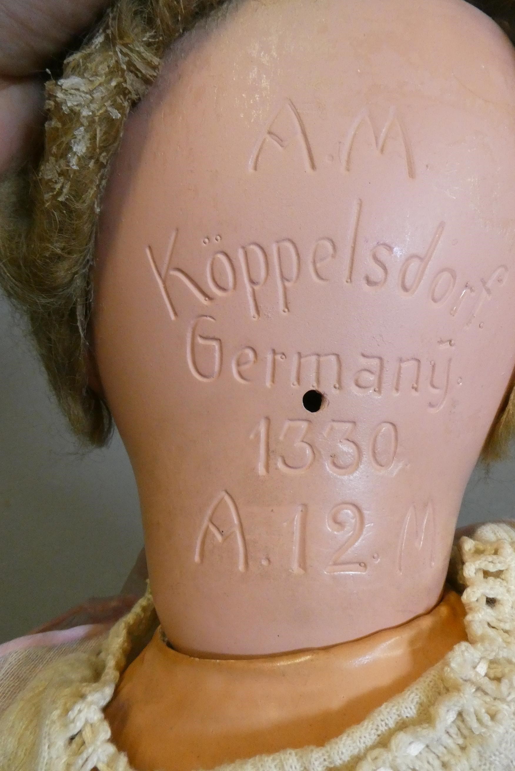 Three bisque socket head dolls Image