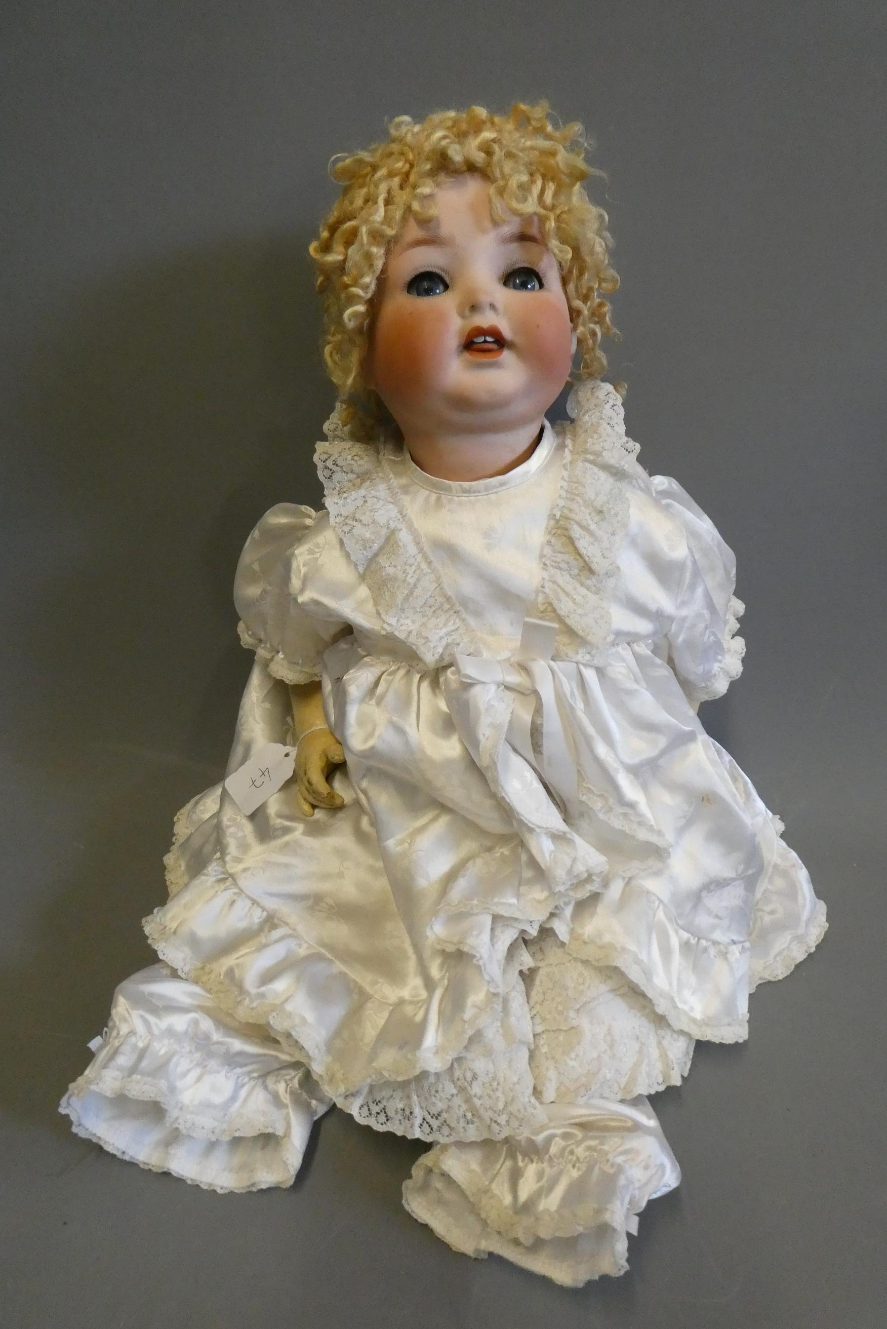 A Heubach Koppelsdorf bisque socket head character doll, with blue glass sleeping eyes, open mouth, Image
