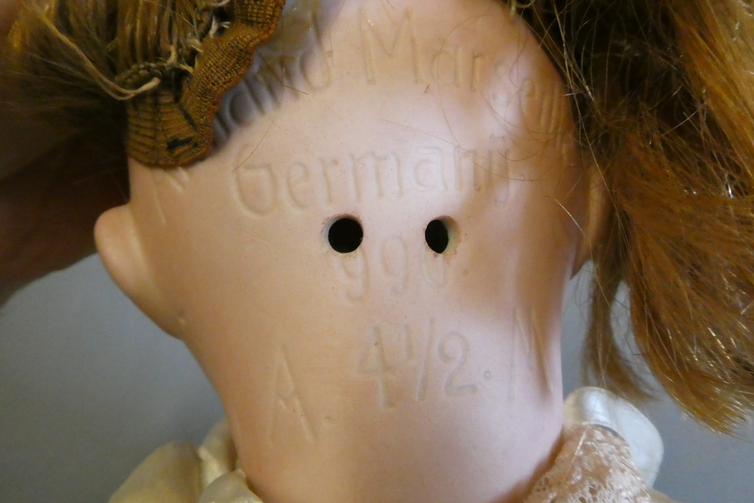 Four bisque socket head dolls Image