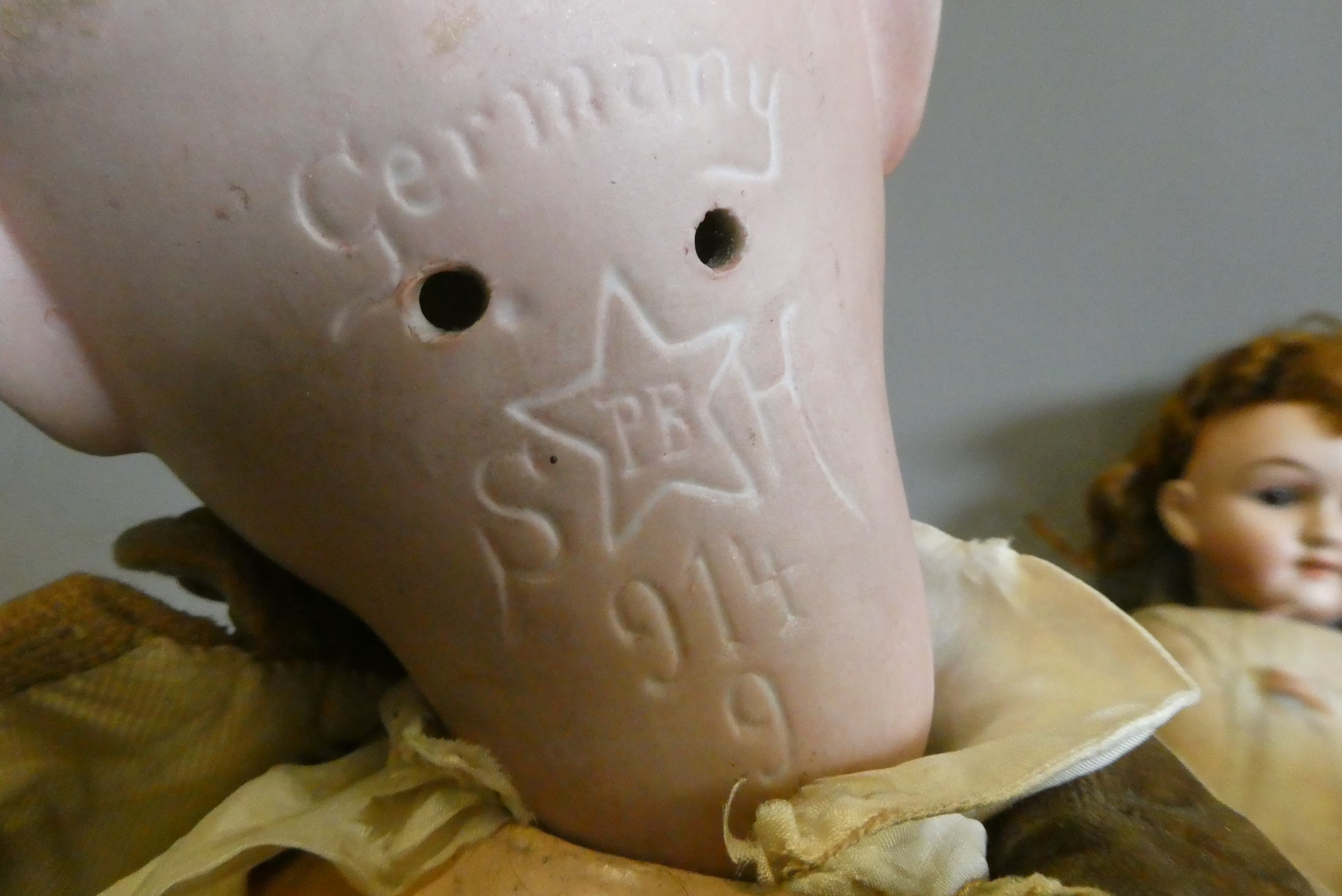 Four bisque socket head dolls Image