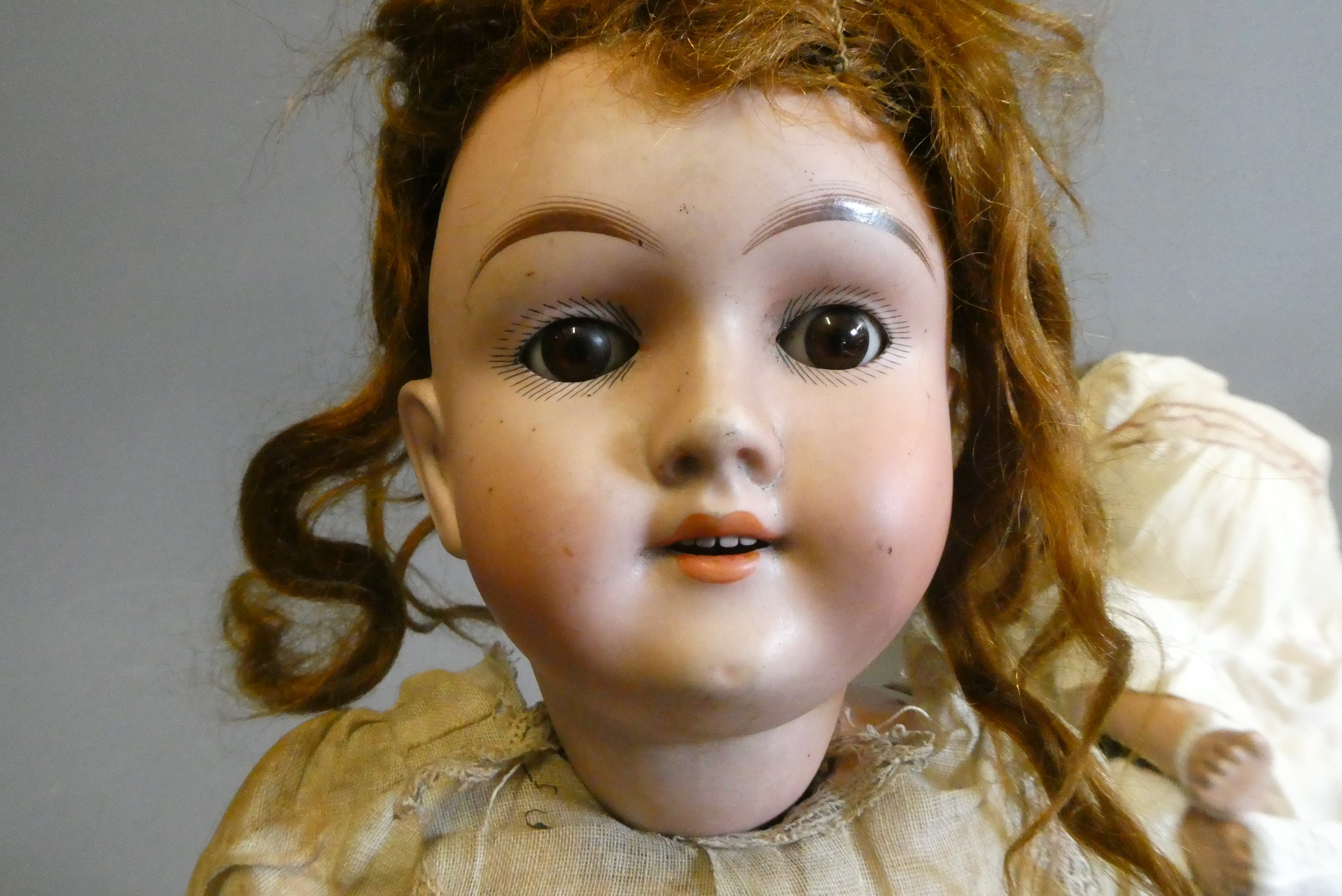 Four bisque socket head dolls Image