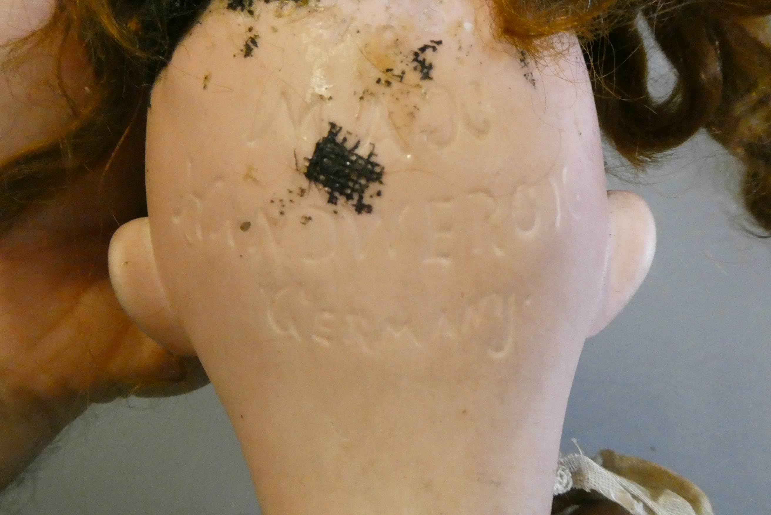 Four bisque socket head dolls Image