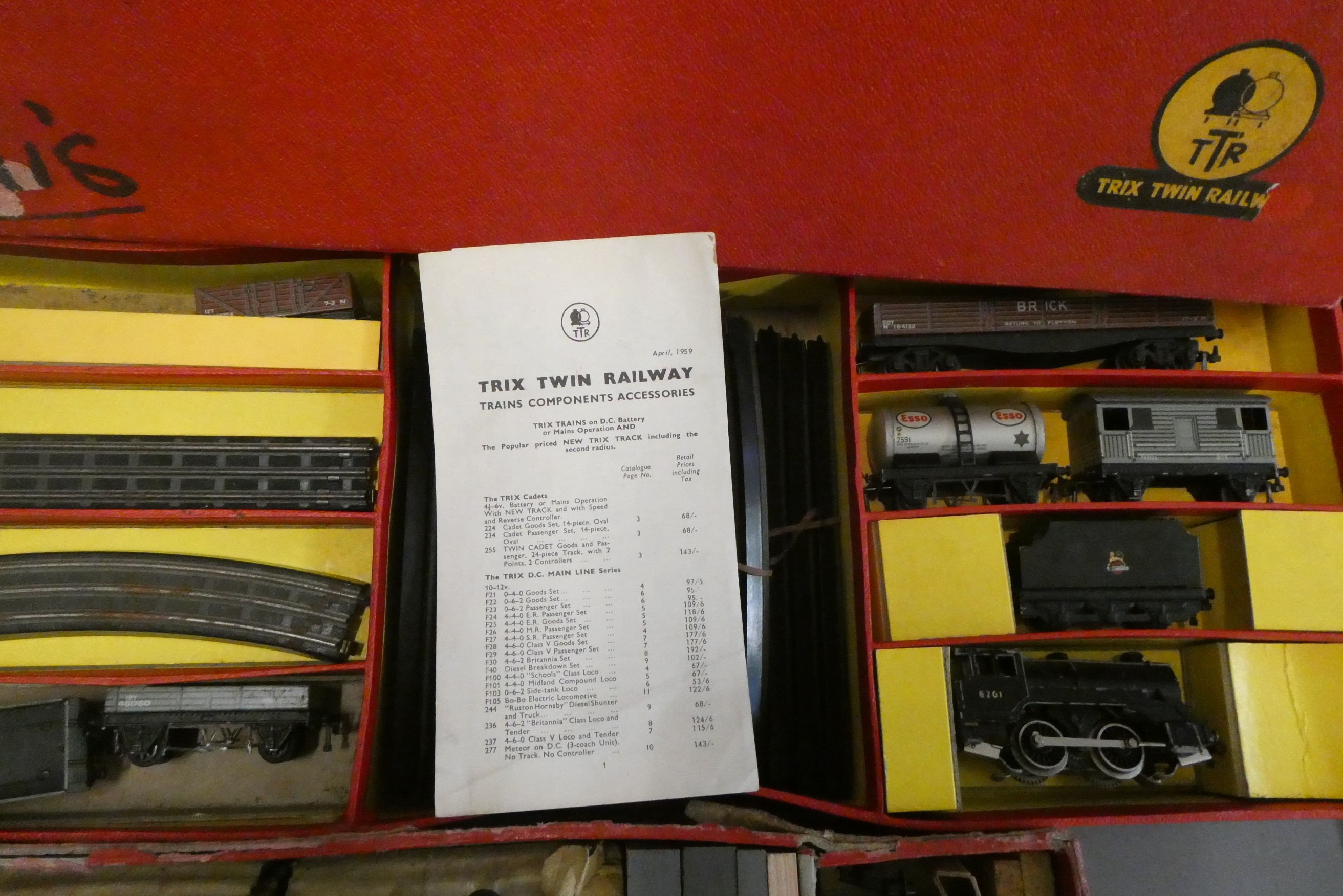 Two trix-twin goods train sets with 0-4-0 tender locomotives, goods ...