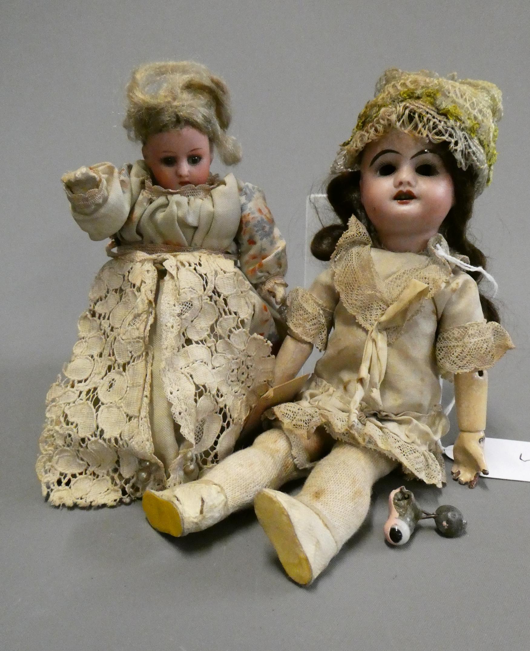 Two miniature bisque socket head dolls Image