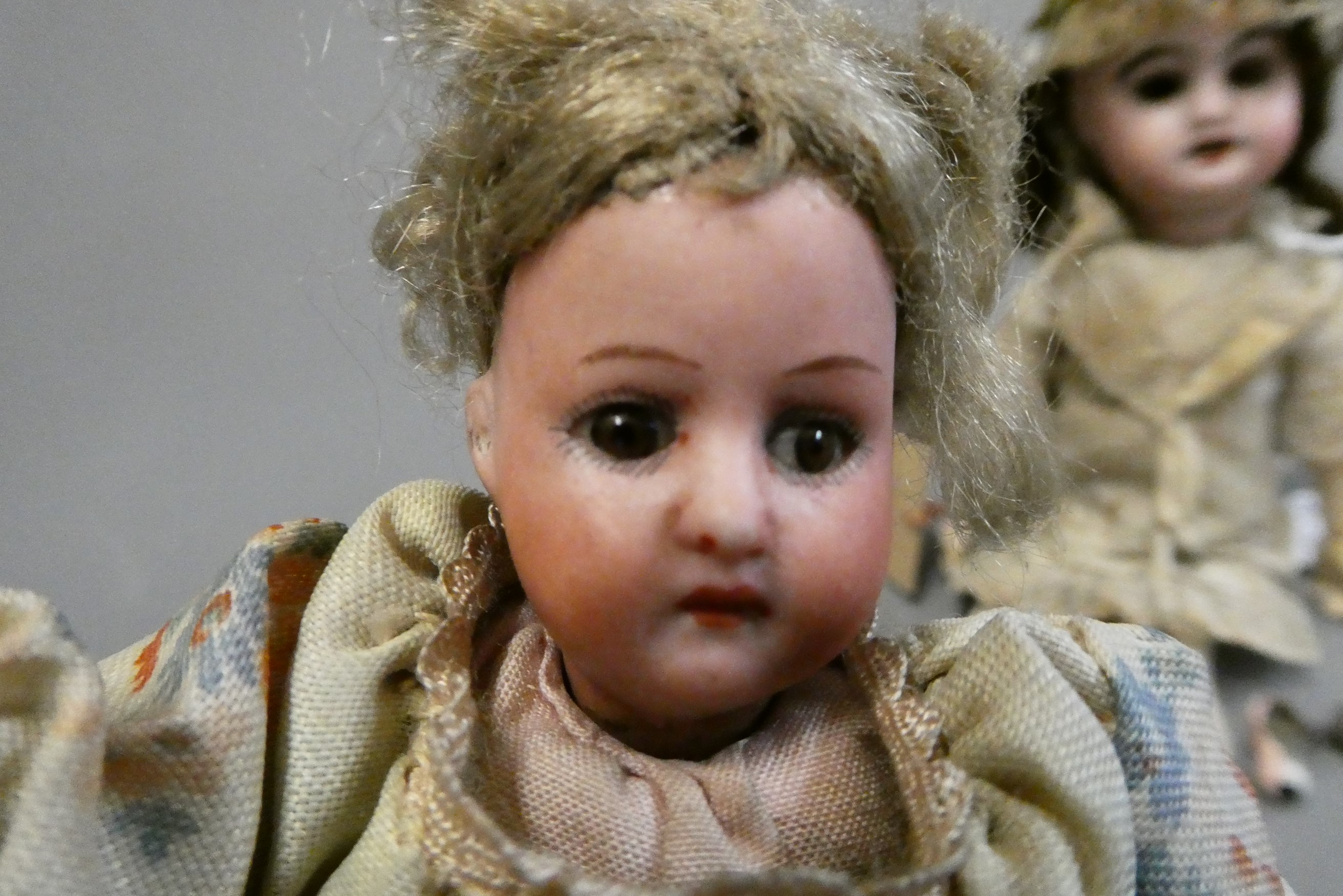 Two miniature bisque socket head dolls Image
