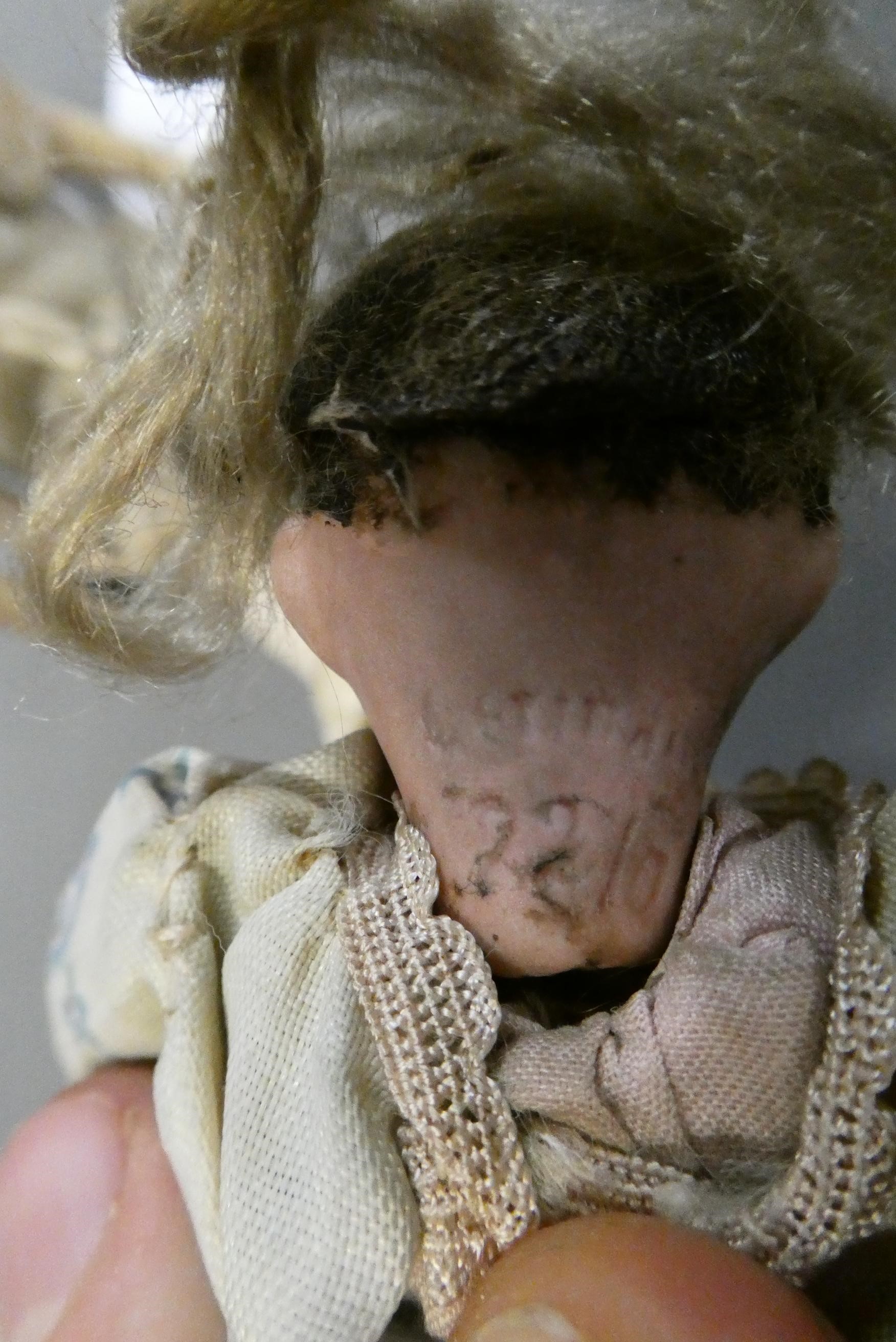 Two miniature bisque socket head dolls Image